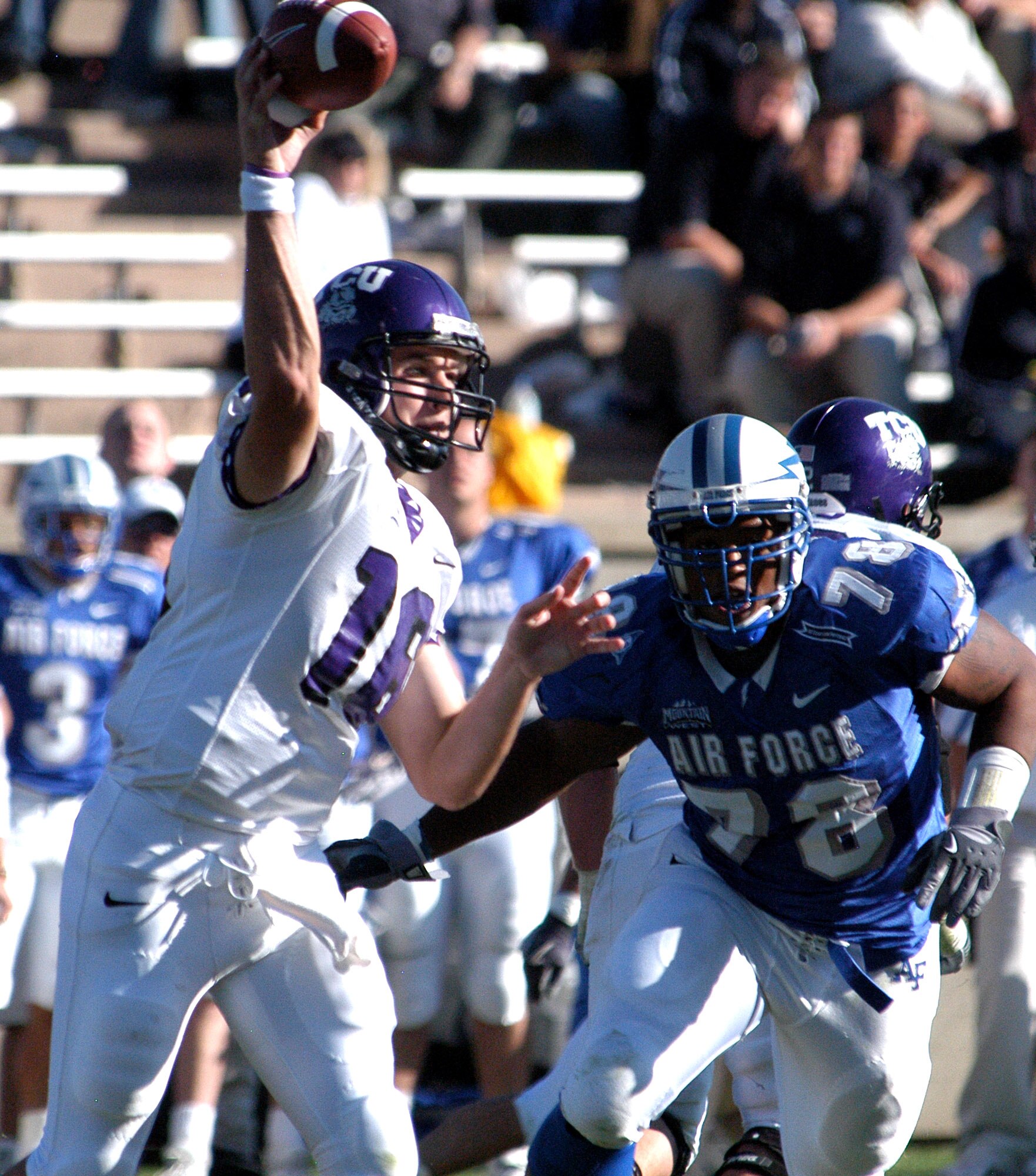 U.S. AIR FORCE ACADEMY, Colo. -- Falcons defensive end Nelson Mitchell arrives too late to interfere with Texas Christian University quarterback Jeff Ballard, who played in place of starter Tye Gunn. Ballard completed 20 of 28 passes for 302 total yards. TCU won, 48-10.  (U.S. Air Force photo by 2nd Lt. John Ross)