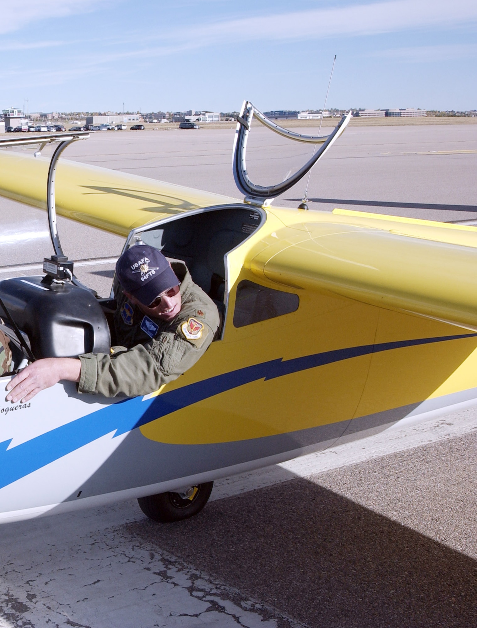 Major Bill Gagen peeks out of the cockpit of a glider before takeoff recently at the U.S. Air Force Academy in Colorado Springs, Colo.  Major Gagen and about 30 other Reservists formed for the squadron recently giving Reservists a more prominent role in training cadets at the school. (Photo by Tech. Sgt. Jason Tudor)