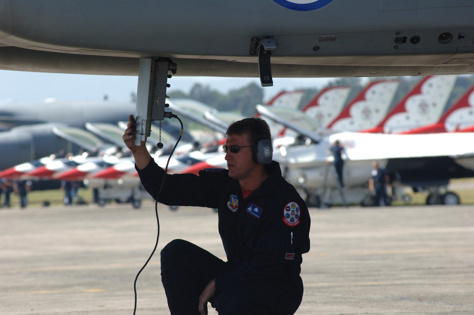 GUATEMALA CITY, GUATEMALA- Tech. Sgt. Barry Snokhous checks an F-15 Eagle's fire warning system prior to its performance in a Guatemalan International Air Show 2005. Sergeant Snokhous is a member of the West Coast F-15 Demonstration Team, which participated in the airshow Oct. 26 as part of a three-country tour to include Guatemala, EL Salvador, and Mexico. (U.S. Air Force photo by Staff Sgt. Matthew Lohr)

