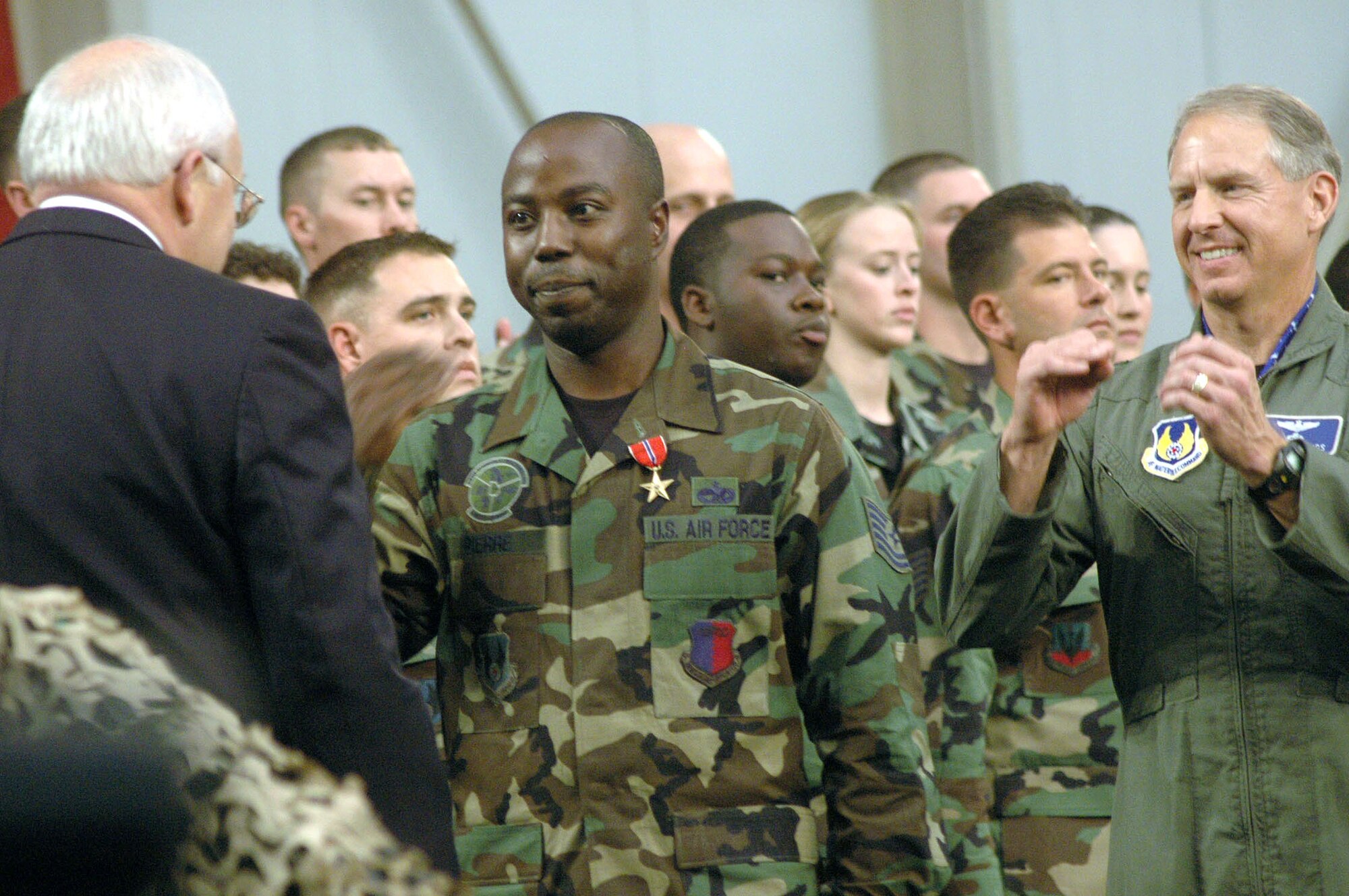 WASHINGTON (AFPN) -- Vice President Dick Cheney awards the Bronze Star medal to Tech. Sgt. Jason Pierre, 78th Logistics Readiness Squadron at Robins Air Force Base, Ga. (U.S. Air Force photo by Sue Sapp)
