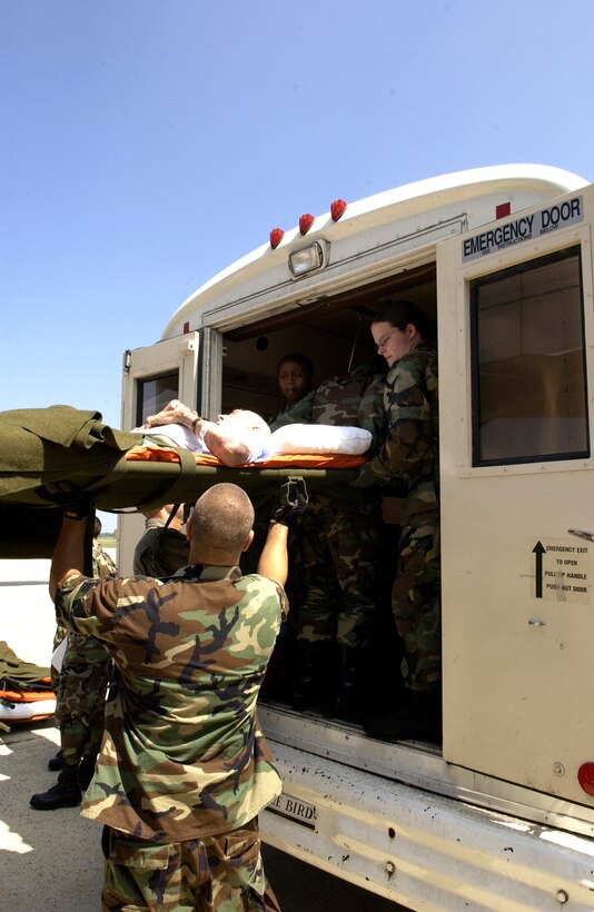 ANDREWS AIR FORCE BASE, Md. - A veteran from the Armed Forces Home in Gulfport, Miss., is lifted onto a bus here after Airmen with the 908th Airlift Wing at Maxwell Air Force Base, Ala., the 375th Aeromedical Evacuation Squadron at Scott AFB, Ill., and the 89th Medical Group here helped transport veterans from the Armed Forces Home after Hurricane Katrina decimated the area. The veterans were flown by a C-130 Hercules from Maxwell to here where they were then taken to the Armed Forces Home in Washington, D.C. (U.S. Air Force photo by Staff Sgt. Christopher J. Matthews)