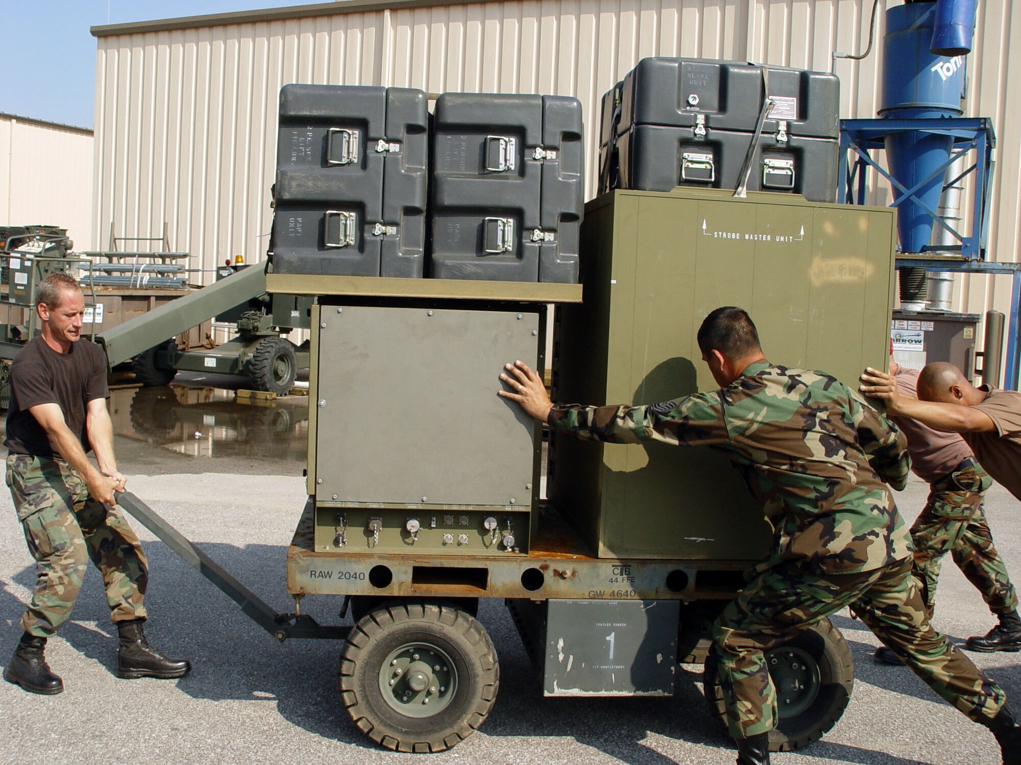 HURLBURT FIELD, Fla. -- Airmen with the 823rd Red Horse Squadron prepare an emergency airfield lighting system for deployment to Keesler Air Force Base, Miss.  Teams of combat engineers have mobilized since Aug. 30 to support rescue and relief operations, debris removal and damage assessments at some of the worst-hit areas.  (U.S. Air Force photo by Airman 1st Class Chris Bautista)