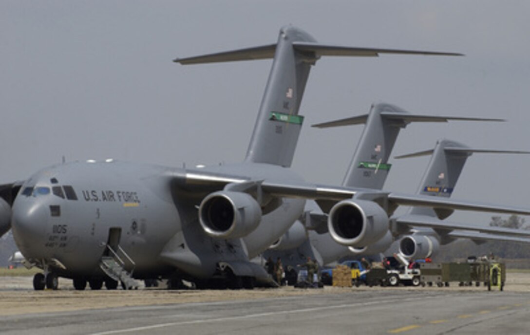 Three U S Air Force C 17 Globemaster Iii Aircraft Offload Tons Of Equipment