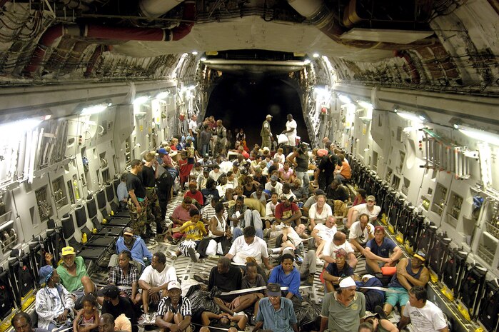 ONBOARD A C-17 GLOBEMASTER III -- More than 140 evacuees from New Orleans, victims of flooding caused by Hurricane Katrina, flew to Austin, Texas.  There, they were given food, fresh water and a place to sleep.  (U.S. Air Force photo by 1st Lt. Neil Senkowski)  