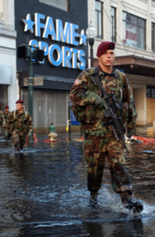 U.S. Army Sgt. Daniel Loeffler and his team wade through the flooded streets of the French Quarter in New Orleans, La., during a patrol in support of Joint Task Force Katrina on Sept. 4, 2005. Loeffler is attached to Company C, 2nd Battalion, 505th Parachute Infantry Regiment, 82nd Airborne Division. Department of Defense units are mobilized as part of Joint Task Force Katrina to support the Federal Emergency Management Agency's disaster relief efforts in the Gulf Coast areas devastated by Hurricane Katrina. 