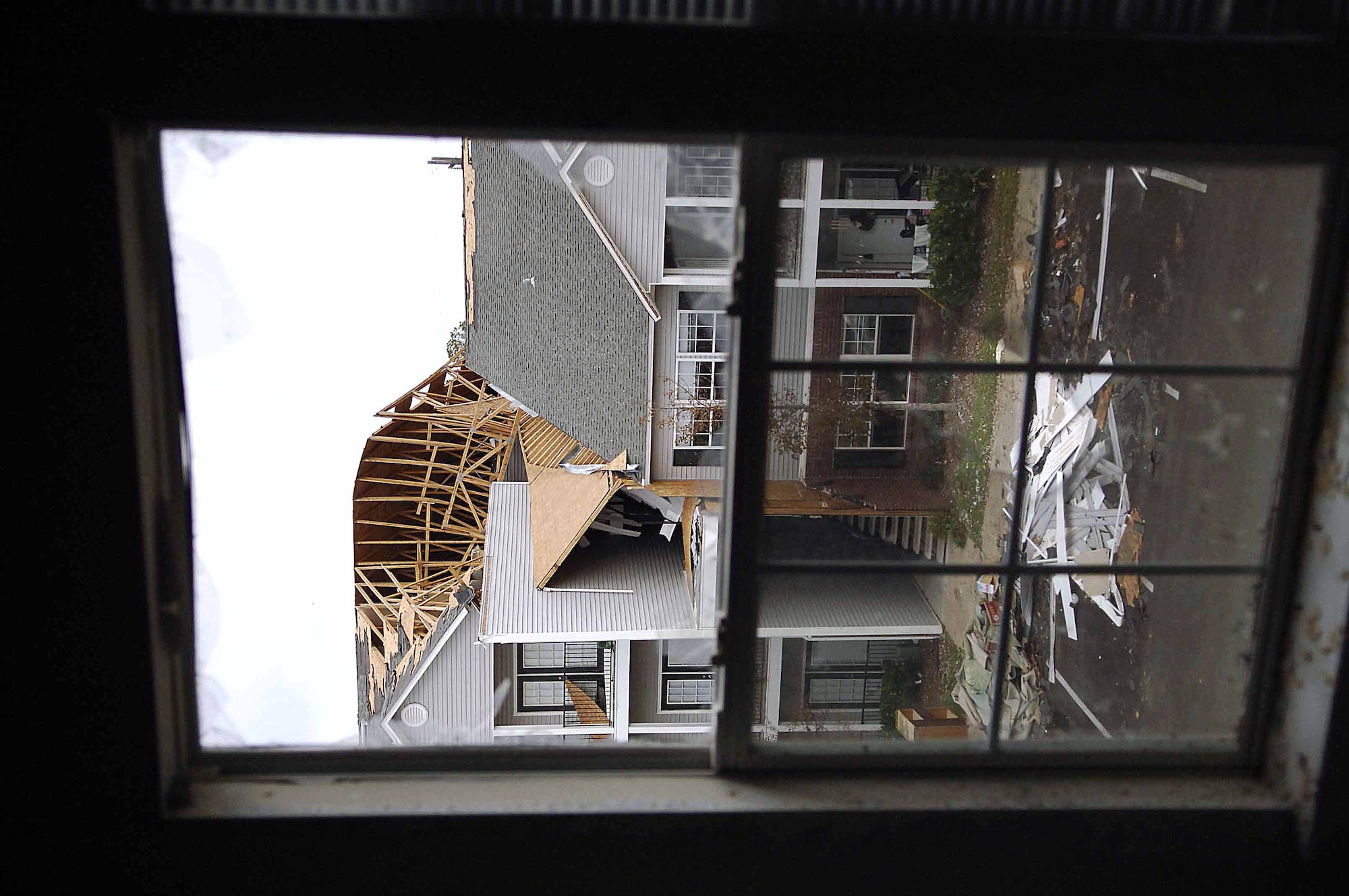 MISSISSIPPI -- The view from an apartment complex window here displays the devastation caused by Hurricane Katrina.  (U.S. Air Force photo)