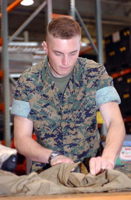 CAMP PENDLETON, Calif. (Sept. 8, 2005) - Sgt. Shannon R. Haynes, the noncommissioned officer in charge of the 15th Marine Expeditionary Unit's administration shop, and Higginsville, Mo. native, defeats another opponent on his way to a 3rd place trophy in the Commanding General's Cup Arm Wrestling Tournament.  (Official USMC photo by Cpl. Scott L. Eberle)