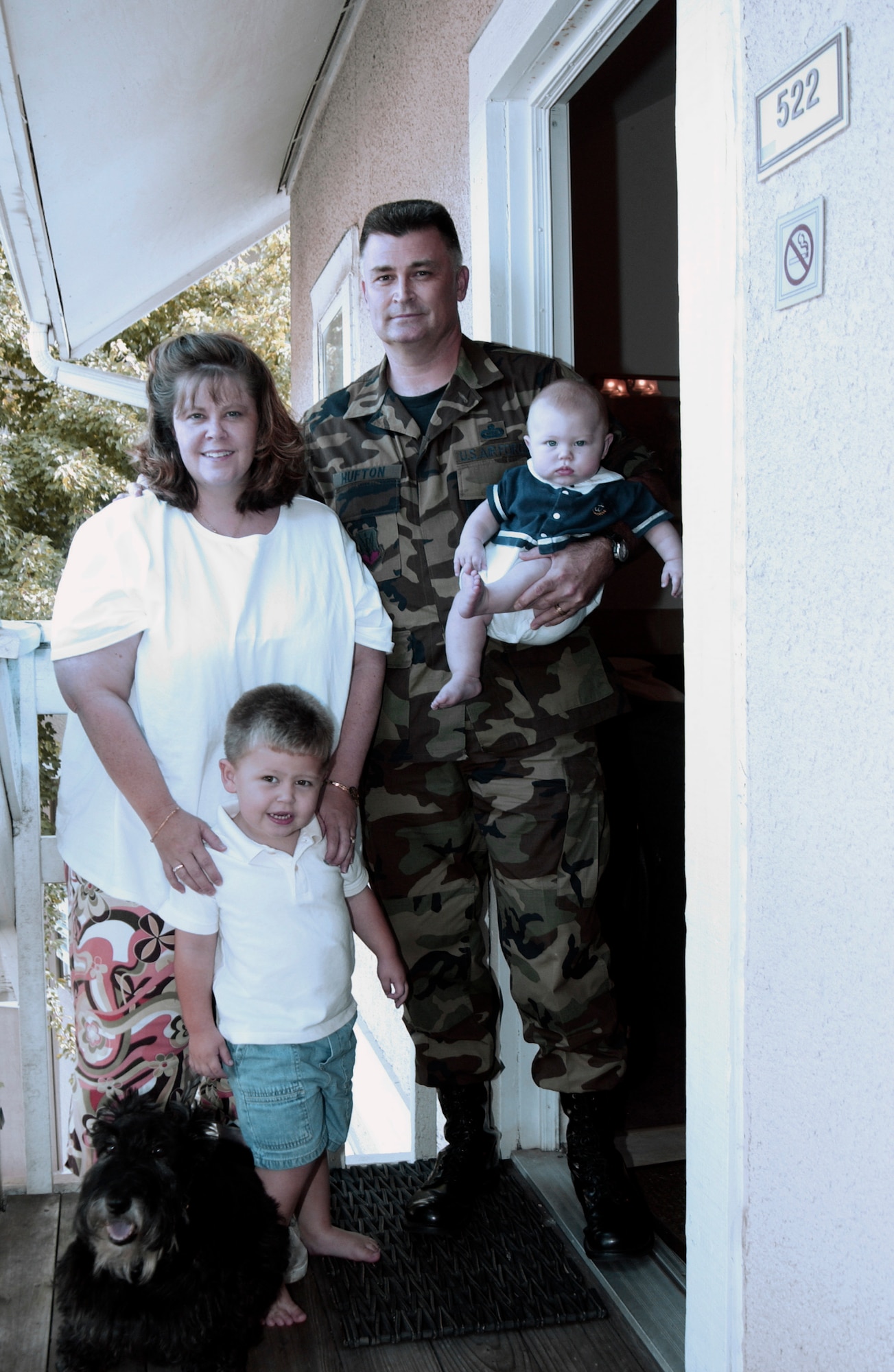 SMYRNA, Ga. -- Senior Master Sgt. David Hufton, his wife, Robin, their two sons, Dawson, 2, and Iain, 5 months, and their dog, Angus, live at a hotel here close to Dobbins Air Reserve Base.  Sergeant Hufton is an intelligence analyst with the 403rd Wing at Keesler Air Force Base, Miss., and had only been in his house in Ocean Springs, Miss., less than a month when it was destroyed by Hurricane Katrina.  (U.S. Air Force photo by Bo Joyner)