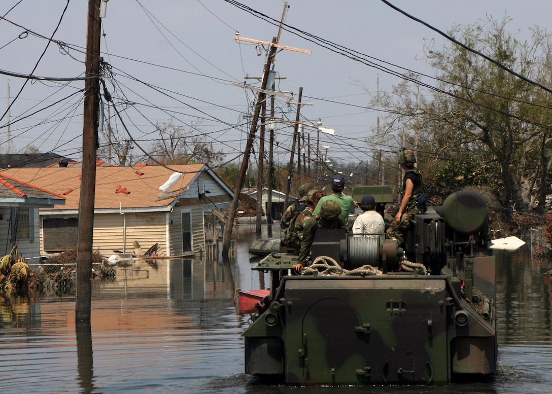 NEW ORLEANS (Sep. 9, 2005) - An amphibious assault vehicle from 4th Amphibious Assault Battalion, a reserve battalion headquartered in Jacksonville, Fla., travels down the streets of New Orleans' Ninth Ward District conducting search and rescue efforts in the wake of Hurricane Katrina. Since SAR missions began on Sep. 5, the Marines of Special Purpose Marine Air Ground Task Force Katrina have rescued more than 78 people.