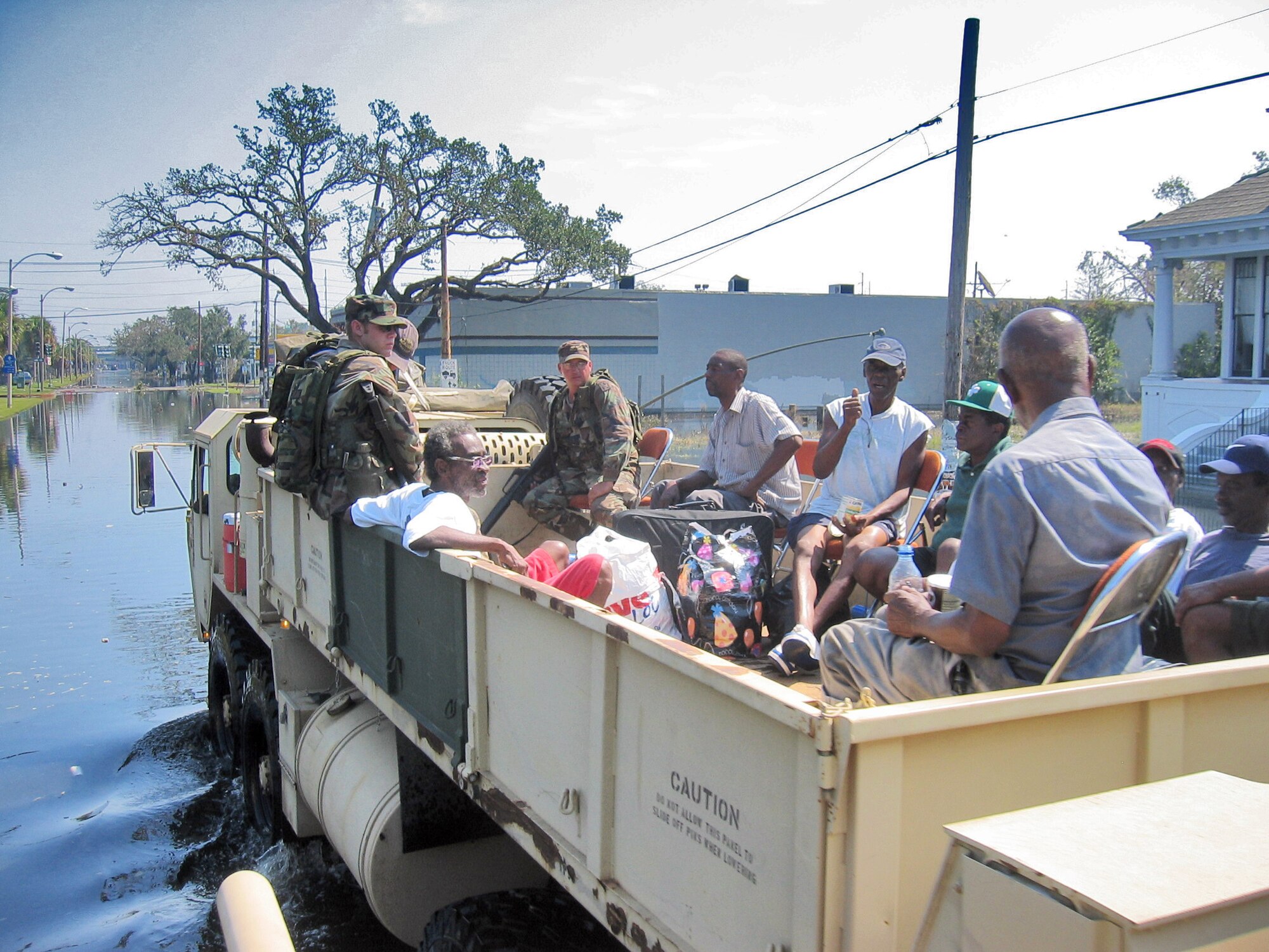 NEW ORLEANS -- A man rescued by Counterdrug National Guardsmen using a Light Armored Vehicle gives a thumb's up after being evacuated from his home. More than 150 victims from the hurricane have been rescued using the LAVs. (Courtesy photo)