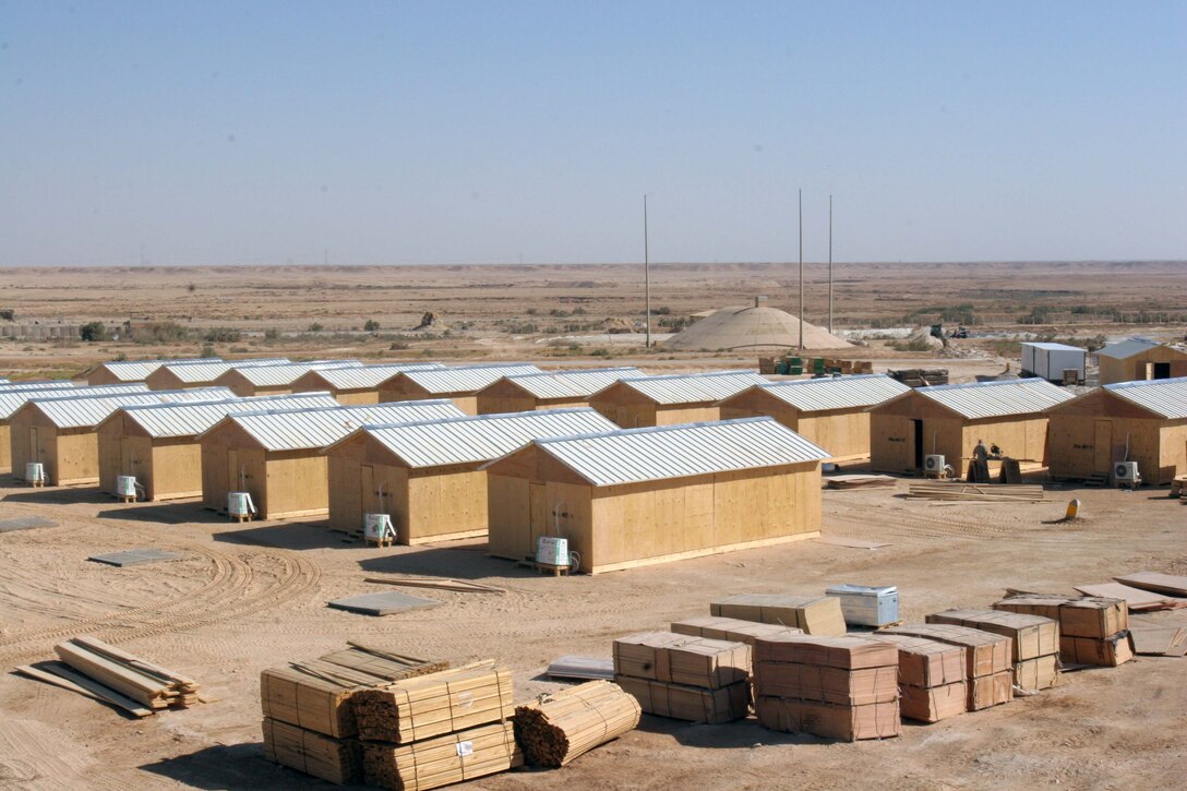 A future Iraqi Security Forces base at Al Asad, Iraq, is slowly coming to life as Marines from the 2nd Force Service Support Group's Engineer Support Battalion build billeting, water purification systems and other essential infrastructure for the future Iraqi base.