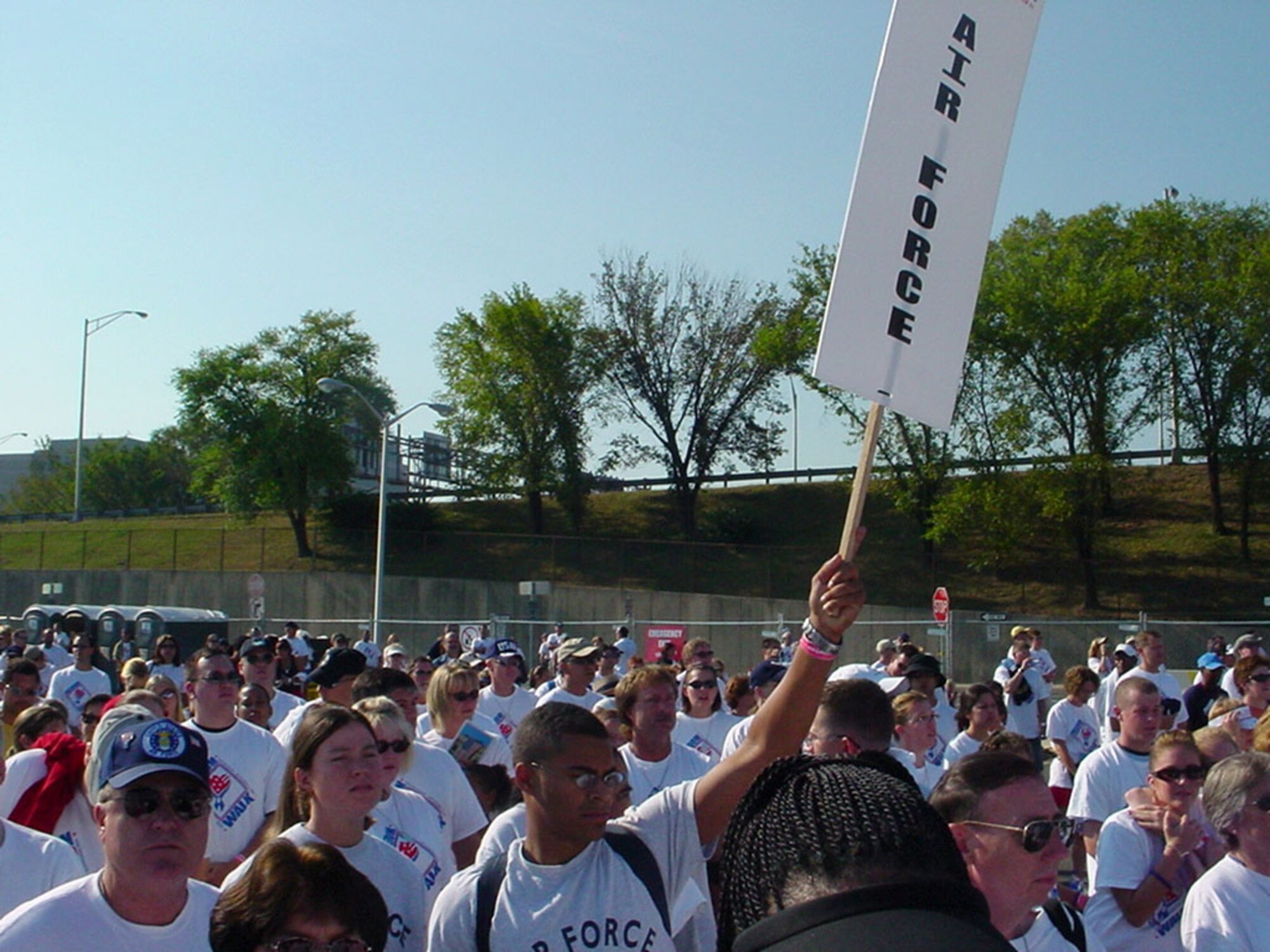 WASHINGTON - Airmen show their support during the first "America Supports You Freedom Walk" on Sept. 11.  Thousands of people participated in the two-mile walk which began at the Pentagon and ended at the National Mall.  (U.S. Air Force photo by Master Sgt. David Byron)