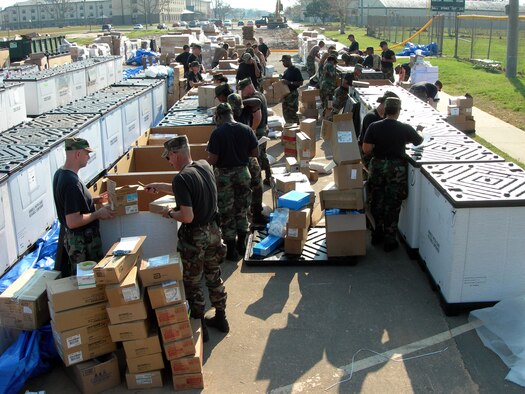 KEESLER AIR FORCE BASE, Miss. -- Airmen with the 97th Air Expeditionary Group take inventory and organize medical supplies that will be used to restock veterinarian and disaster medical assistance teams established along the Gulf Coast by the Federal Emergency Management Agency.  The group, comprising Airmen throughout the United States who began arriving Sept. 6, was established to provide humanitarian assistance to those affected by Hurricane Katrina.  (U.S. Air Force photo)