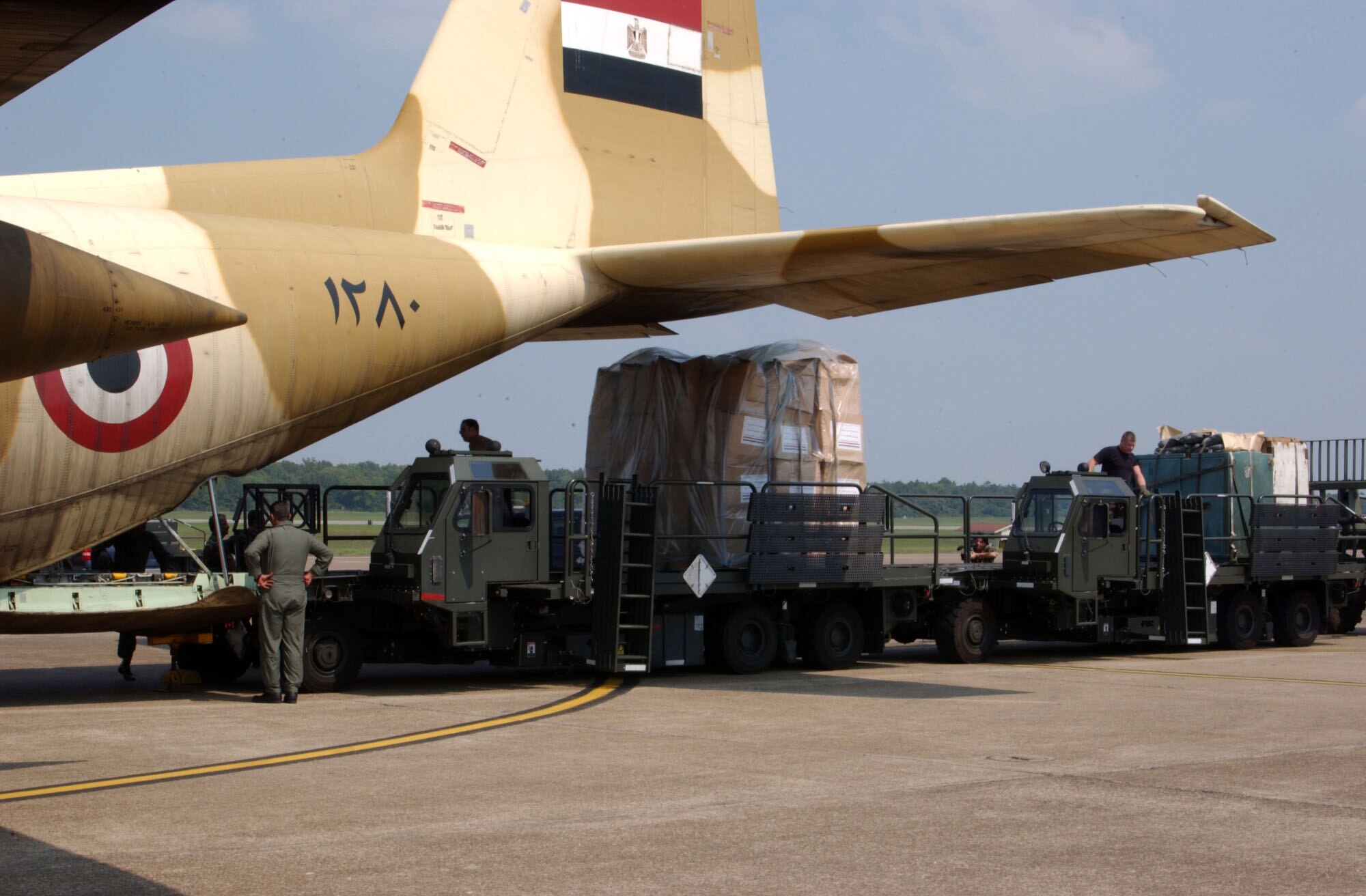 LITTLE ROCK AIR FORCE BASE, Ark. -- A C-130 Hercules from Egypt lands here Sept. 8 with international aid onboard to help the areas affected by Hurricane Katrina.  The C-130 with its cargo is part of the international relief effort to help the United States.  The base is the hub for all international supplies.  (U.S. Air Force photo by Airman 1st Class Roxanne Zellmer)