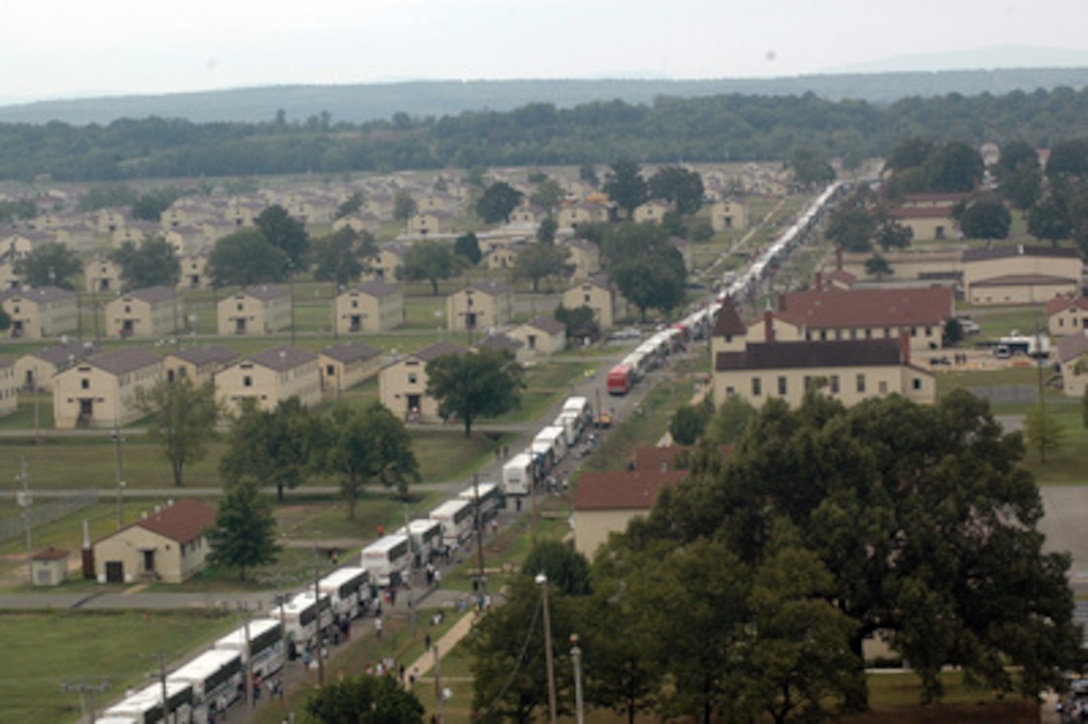 Hundreds of buses disgorge thousands of Hurricane Katrina evacuees at Fort Chaffee Arkansas National Guard post on Sept. 4, 2005. More than 10,000 evacuees took up temporary residence at Fort Chaffee. Department of Defense units are mobilized as part of Joint Task Force Katrina to support the Federal Emergency Management Agency's disaster relief efforts in the Gulf Coast areas devastated by Hurricane Katrina. 