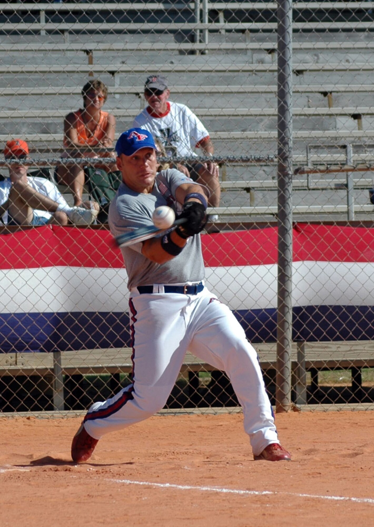 EGLIN AIR FORCE BASE, Fla. -- James Flagg cracks a base hit during the 2005 Armed Forces Men's Softball Championships held here Sept. 7 to 9.  Air Force claimed the title with a 7-2 record during the round-robin tournament.  (U.S. Air Force photo by Staff Sgt. Ryan Hansen)