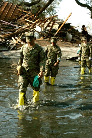 NEW ORLEANS--Marines from 1st Battalion, 8th Marine Regiment patrol the streets of the St. Bernard's Parish Sept. 13.  The Marine are conducting search and rescue, clean-up, and humanitarian assistance operations to help New Orleans get back on its feet after Hurricane Katrina