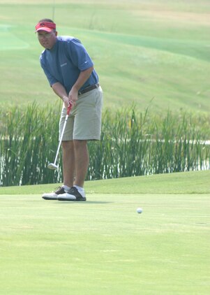 Cpl. Anthony Guas Corporal Chris Garrity, an aviation operations specialist for Marine Fighter Attack Squadron 122, looks at his putt during the last day of the All-Marine Golf Tournament held at The Legends aboard Marine Recruit Depot Parris Island, Sept. 16