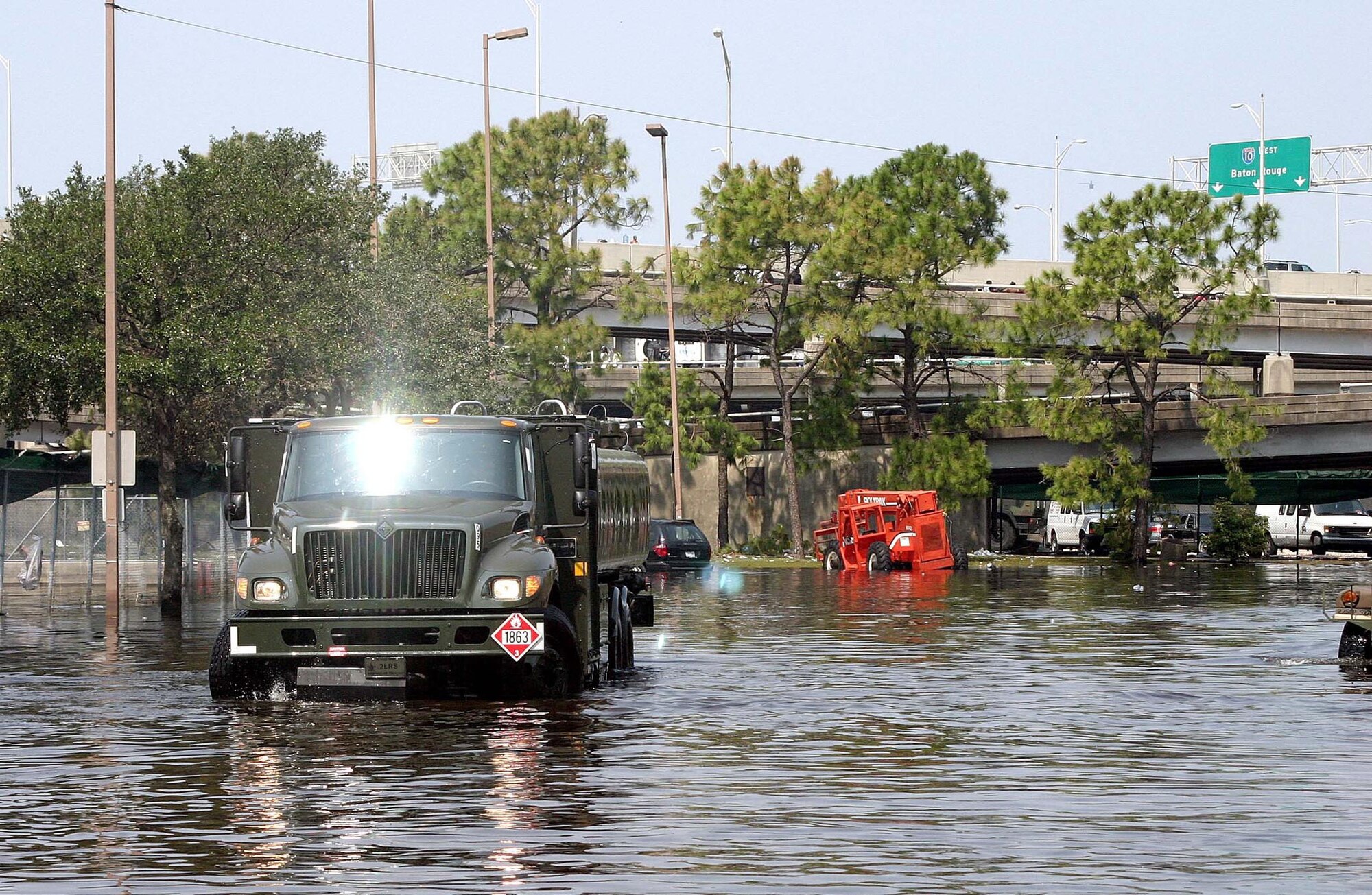 NEW ORLEANS -- An R-11 jet fuel truck drives through the flooded streets here to its operating location.  A fuels team from Barksdale Air Force Base, La., deployed here to assist with refueling operations in the city, to include refueling generators and stranded vehicles.  (U.S. Air Force photo)