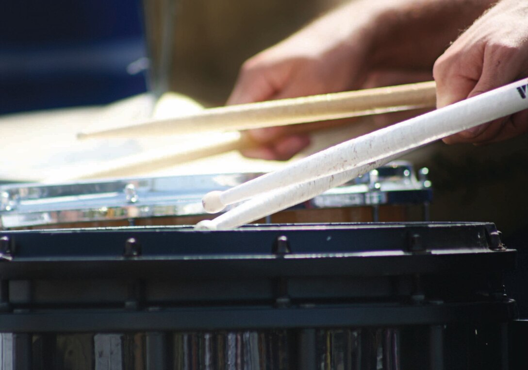 A drummer with the 1st Marine Division Band plays for the crowd at Oceanside's Harbor Days celebration, Sept. 17, 2005.