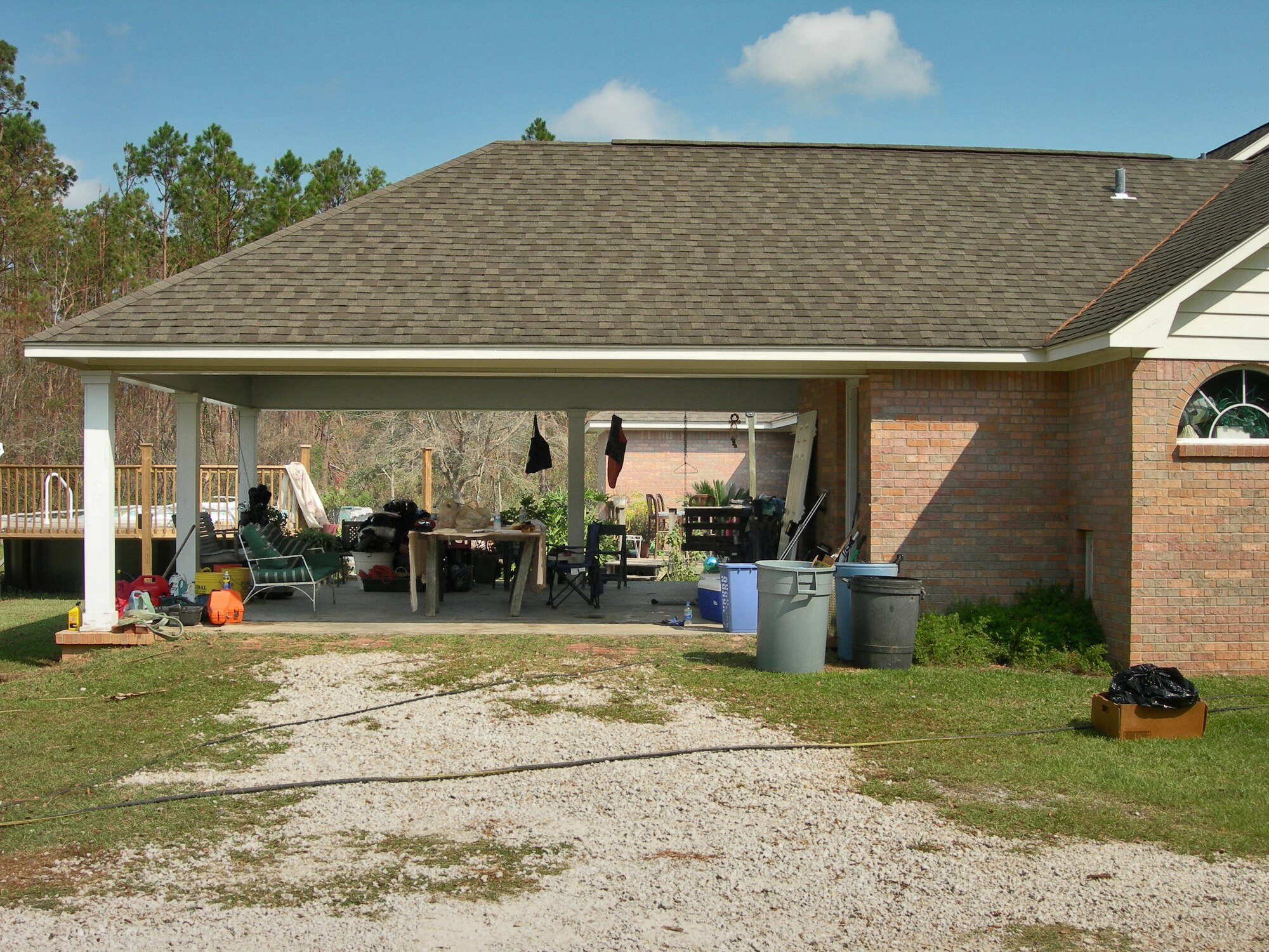 BILOXI, Miss. -- After Hurricane Katrina ravaged the area, Stanley Morgan's home was flooded.  Civil engineers who were deployed to nearby Keesler Air Force Base from Luke AFB, Ariz., helped the Morgan clean up the aftermath.  (U.S. Air Force photo by 1st Lt. Brady Smith)