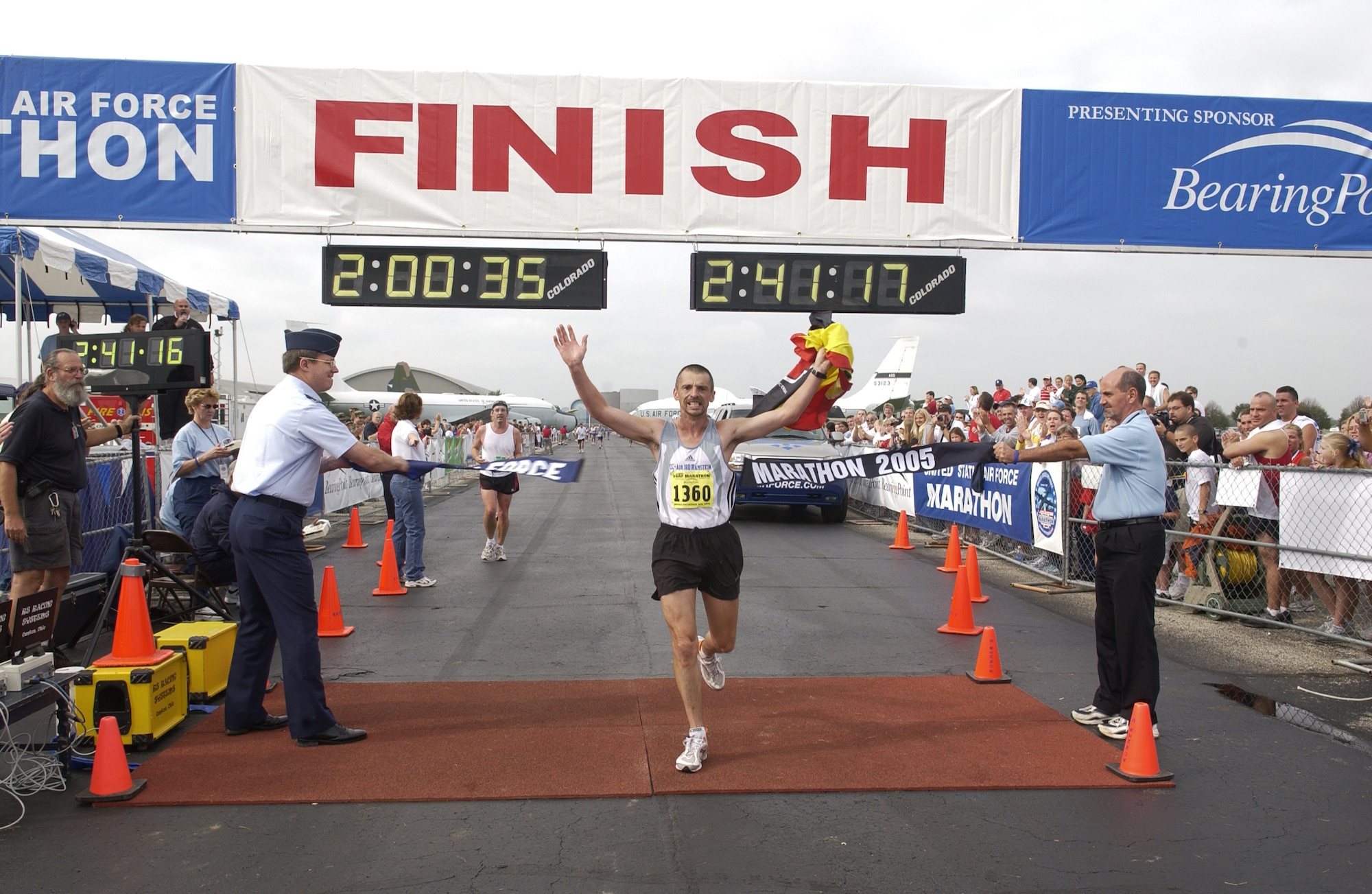 WRIGHT-PATTERSON AIR FORCE BASE, Ohio -- Hendrick Vanloon, a native of Belgium, victoriously runs across the finish line at the ninth annual U.S. Air Force Marathon on Sept. 17, taking first place.  Mr. Vanloon completed the race in 2 hours 41 minutes and 15.9 seconds.  The runners traversed a grueling 26.2 miles here and in the local community.  (U.S. Air Force photo by Tech. Sgt. Tracy L. DeMarco)