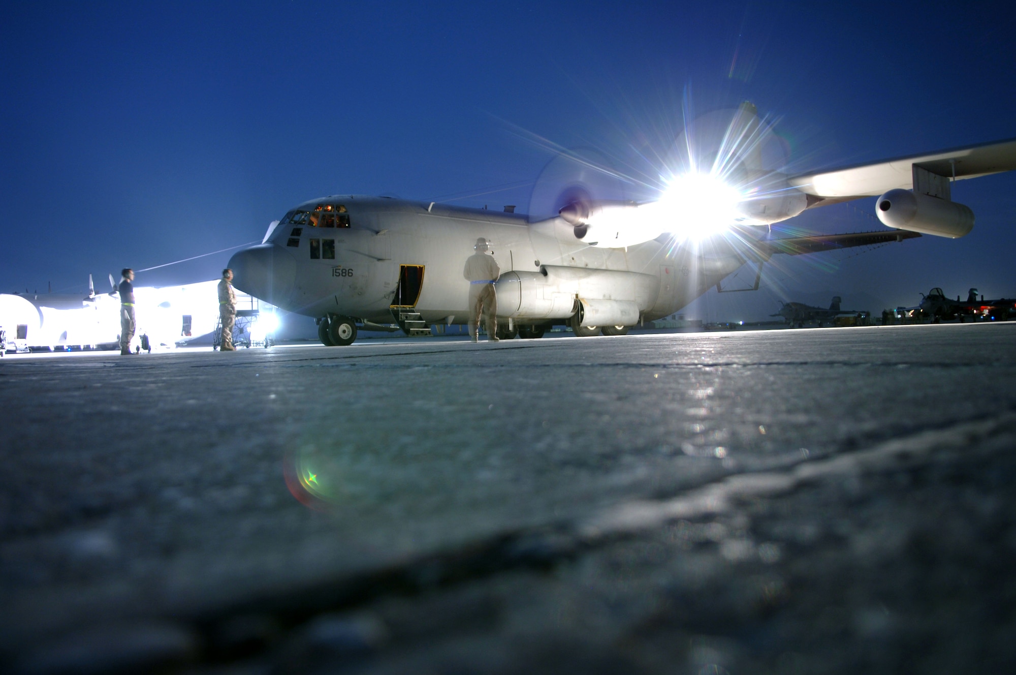 BAGRAM AIR BASE, Afghanistan -- An EC-130H Compass Call aircraft with the 41st Expeditionary Electronic Combat Squadron prepares for takeoff in support of Afghanistan's National Assembly elections Sept. 18.  The aircraft, along with A-10 Thunderbolt IIs and U.S. Navy EA-6B Prowlers, have stepped up efforts throughout Afghanistan to deter enemy aggression and help ensure voter safety.  (U.S. Air Force photo by Capt. James H. Cunningham)