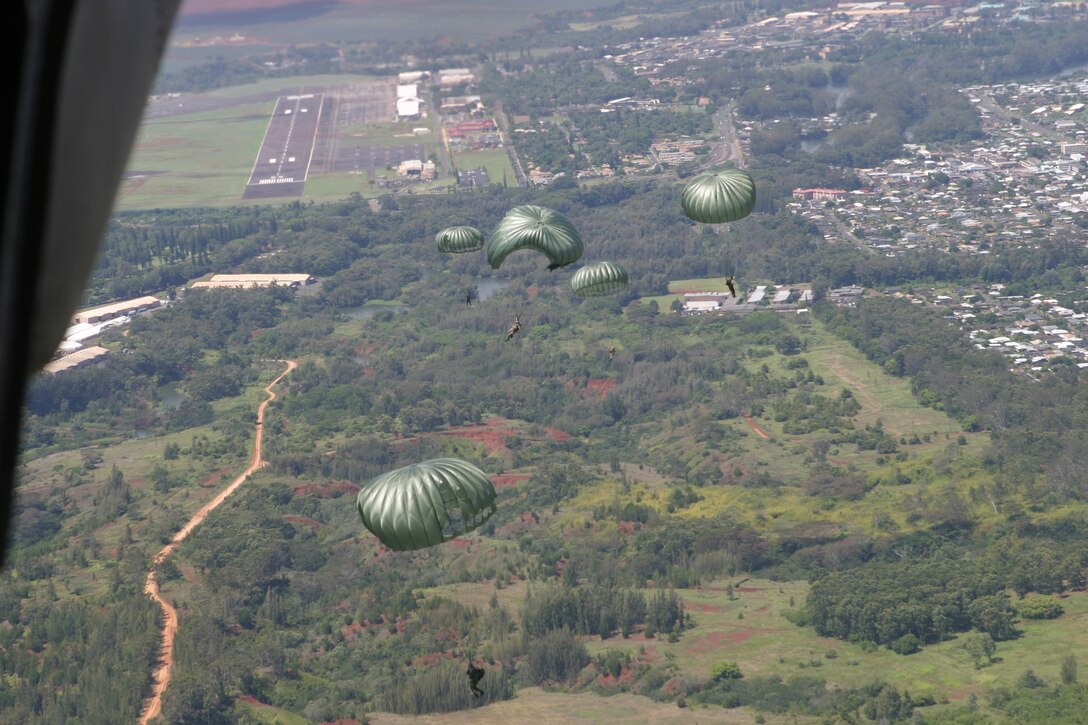 Soldiers from Special Operations Command Pacific jump from 1,500 feet to practice their high altitude low opening jumps.  The soldiers also jumped from 10000 ft.