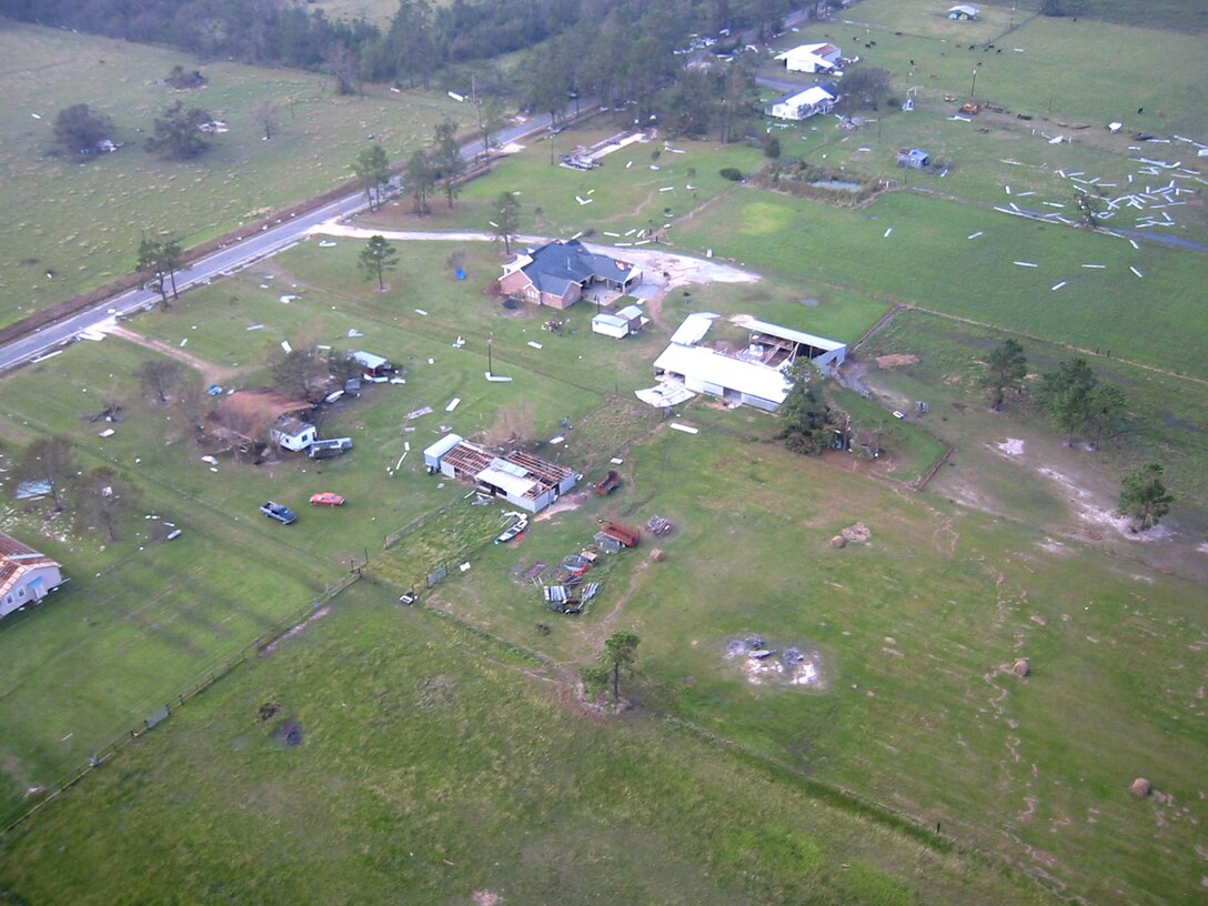 RANDOLPH AIR FORCE BASE, Texas -- Homes near the Texas-Louisiana border lie damaged or destroyed following the pounding they took from Hurricane Rita's wind and rain. The homes were in an area searched by the 349th Air Expeditionary Group. The search-and-rescue unit, staging from here, is made up of active-duty and Reserve forces. (U.S. Air Force photo by Tech. Sgt. Jason Tudor)
