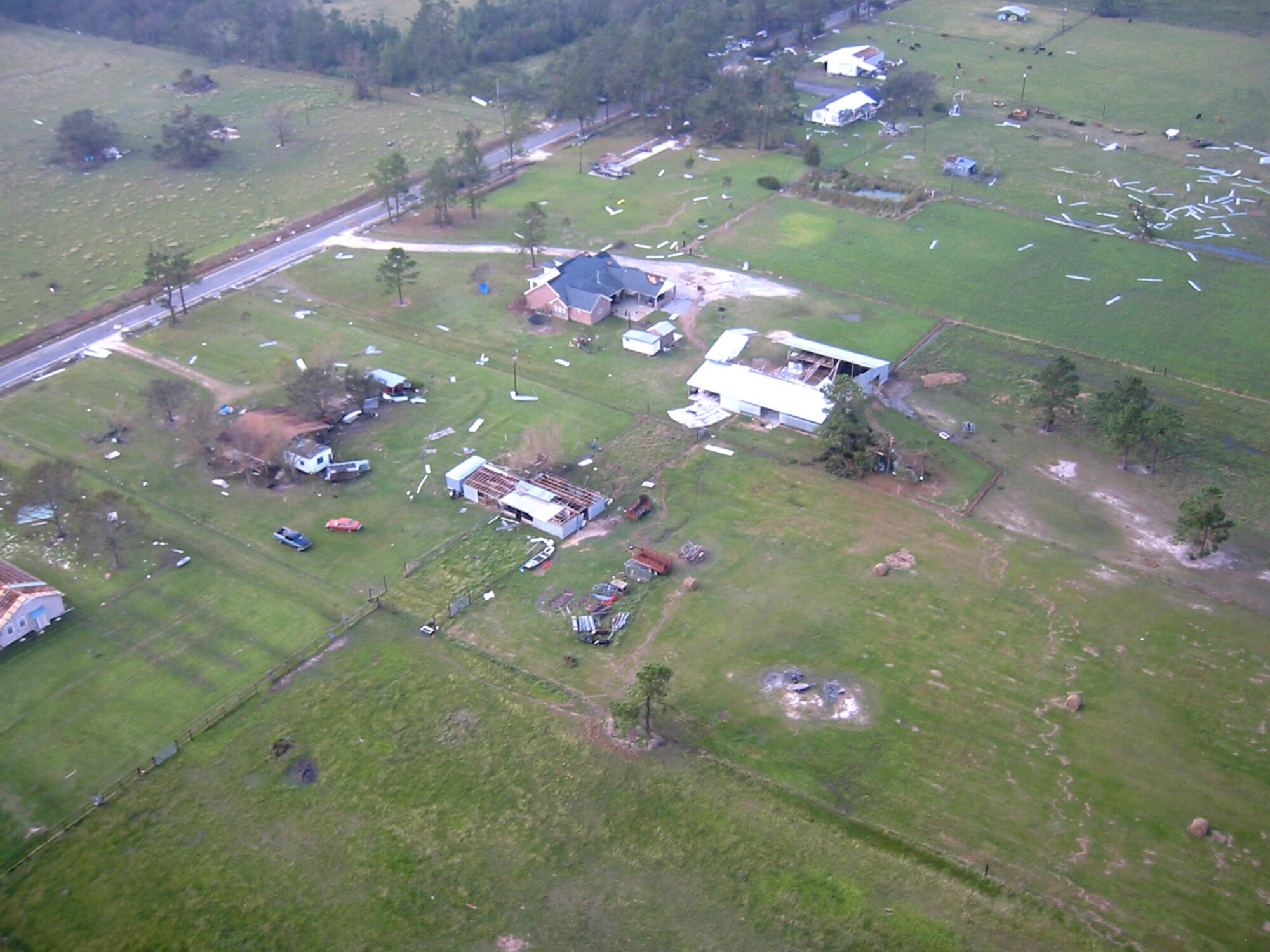 RANDOLPH AIR FORCE BASE, Texas -- Homes near the Texas-Louisiana border lie damaged or destroyed following the pounding they took from Hurricane Rita's wind and rain. The homes were in an area searched by the 349th Air Expeditionary Group. The search-and-rescue unit, staging from here, is made up of active-duty and Reserve forces. (U.S. Air Force photo by Tech. Sgt. Jason Tudor)
