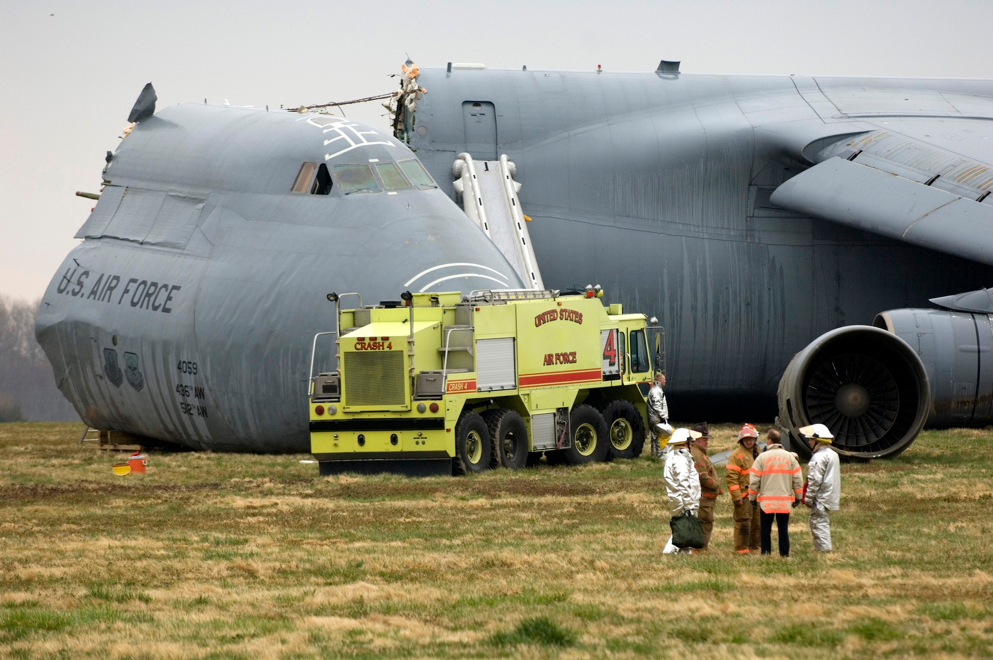 Emergency responders are on the scene of a C-5 Galaxy crash today, April 3, 2006 at Dover Air Force Base, Del. (U.S. Air Force photo/Doug Curran)