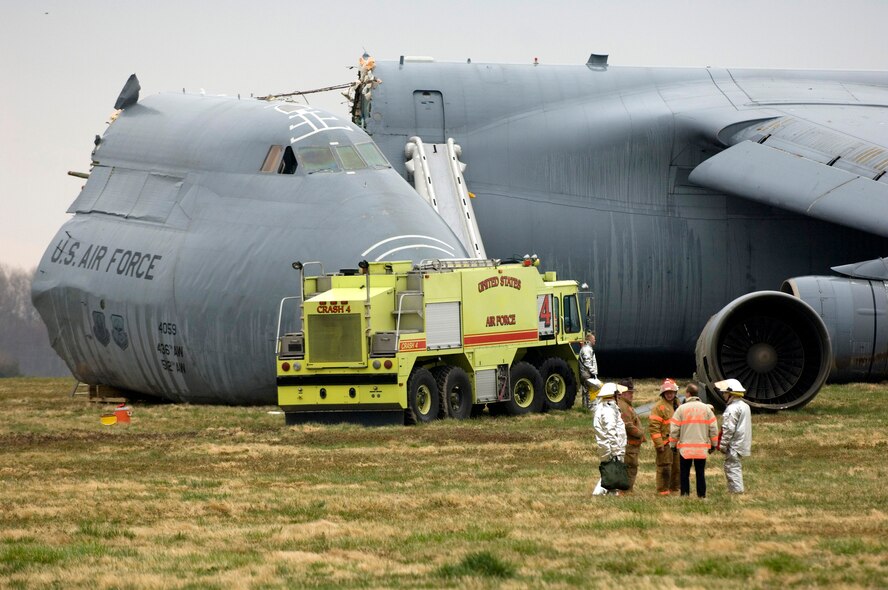 Emergency responders are on the scene of a C-5 Galaxy crash, April 3, 2006 at Dover Air Force Base, Del. (U.S. Air Force photo/Doug Curran) 