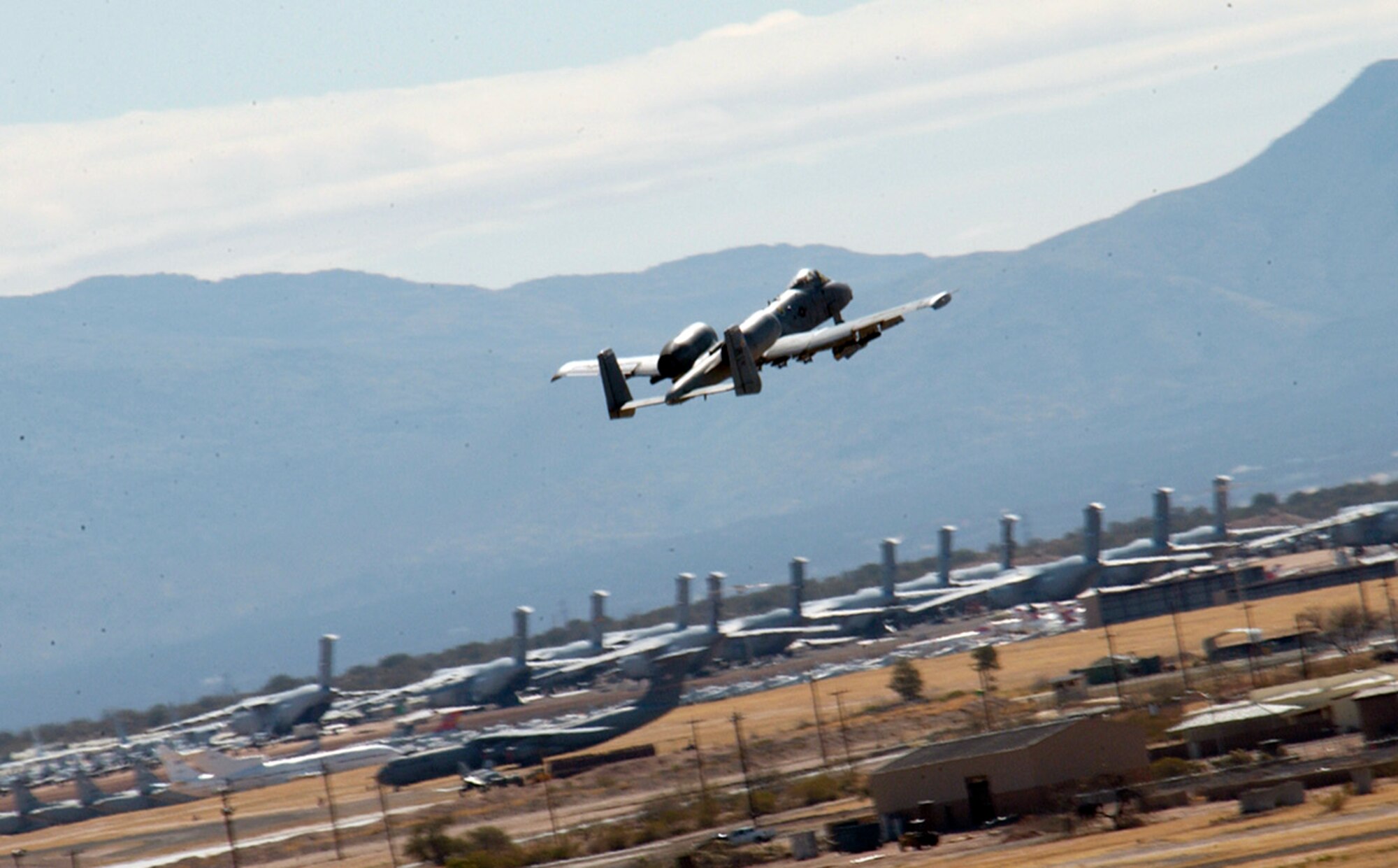 An A-10 Thunderbolt II from the 354th Fighter Squadron flies in support of Exercise Bushwacker 06-02 at Davis-Monthan Air Force Base, Ariz., on Saturday, April 1, 2006.  The operational readiness exercise helps ensure Airmen are ready to deploy. (U.S. Air Force photo/Airman Alesia Goosic)
