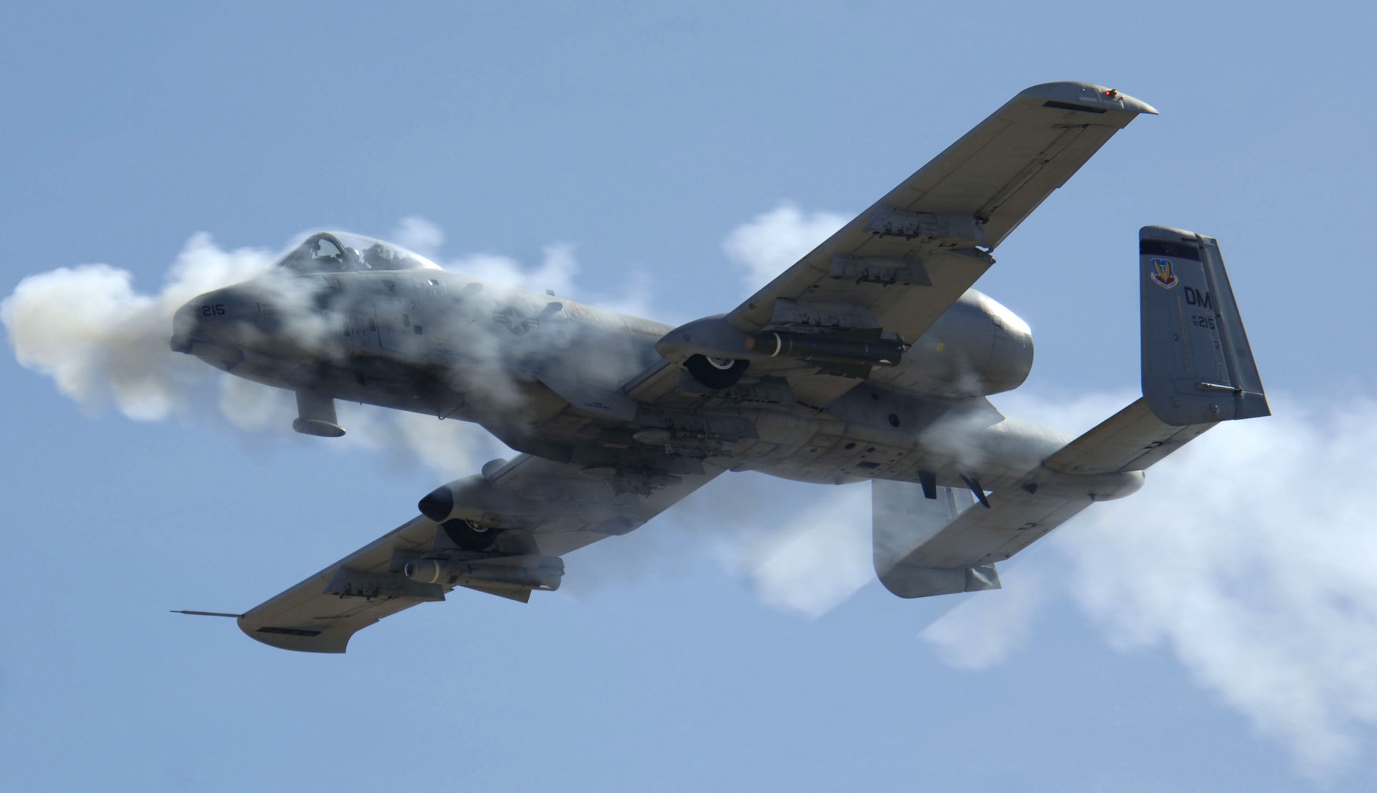 An A-10 from the 355th Wing at Davis-Monthan Air Force Base, Ariz., delivers a volley of 30mm rounds to a stationary ground target during the Hawgsmoke A-10 gunnery and bombing competition at the Barry Goldwater Range complex in Arizona. Four pilots from Air Force Reserve Commands 442nd Fighter Wing, 303rd Fighter Squadron took first place overall in the competition March 22-25 flying aircraft from the 355th Wing, as their own A-10s are being prepared for an overseas deployment. (U.S. Air Force photo by Senior Airman Christina D. Ponte)