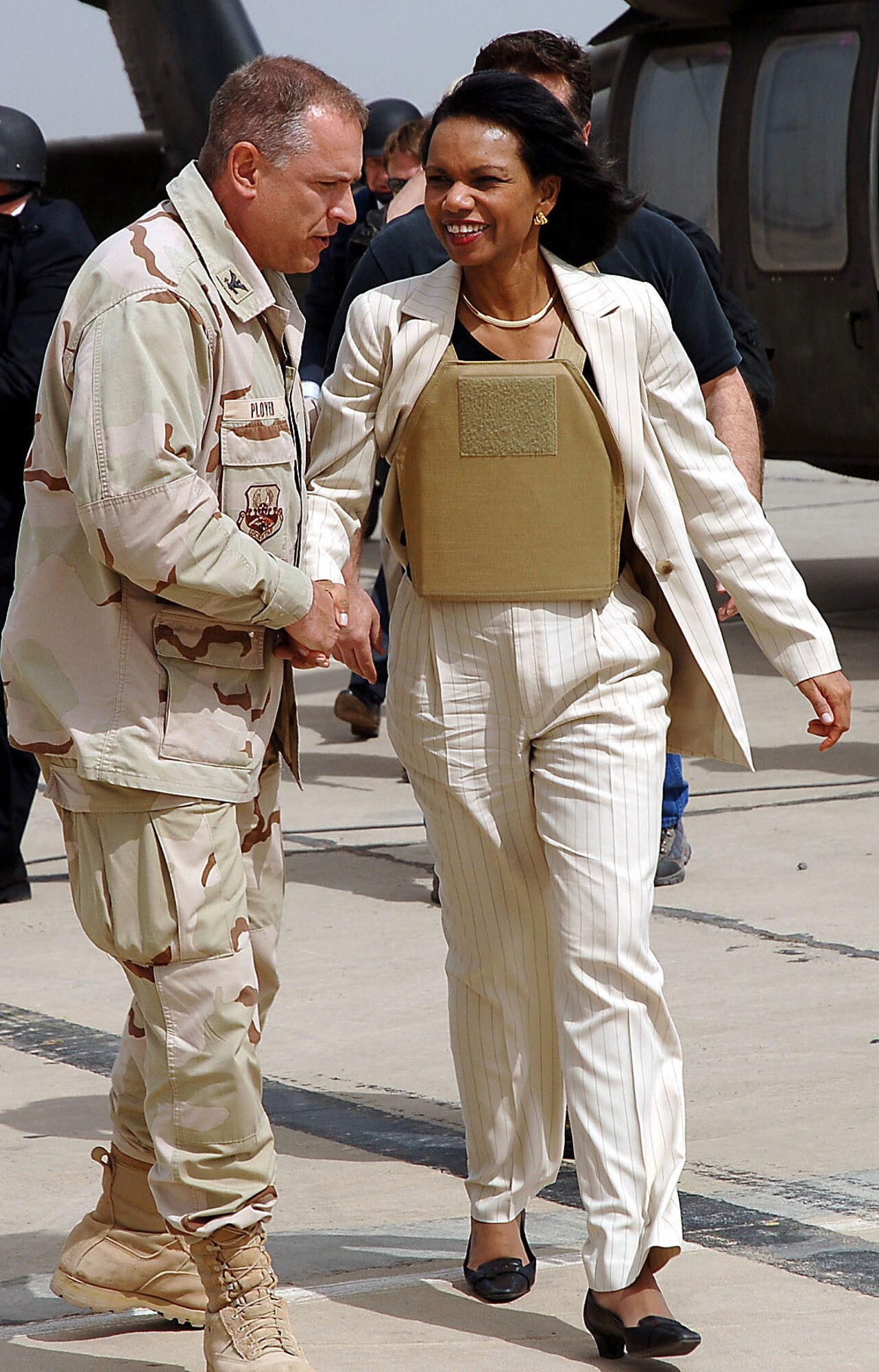 Col. Dennis Ployer greets Condoleezza Rice, U.S. secretary of state, at Sather Air Base, Iraq, on Monday, April 3, 2006. Secretary Rice and Jack Straw, United Kingdom foreign secretary, met with Iraqi officials in Baghdad. Colonel Ployer is the 447th Air Expeditionary Group commander. (U.S. Air Force photo/Master Sgt. Will Ackerman) 