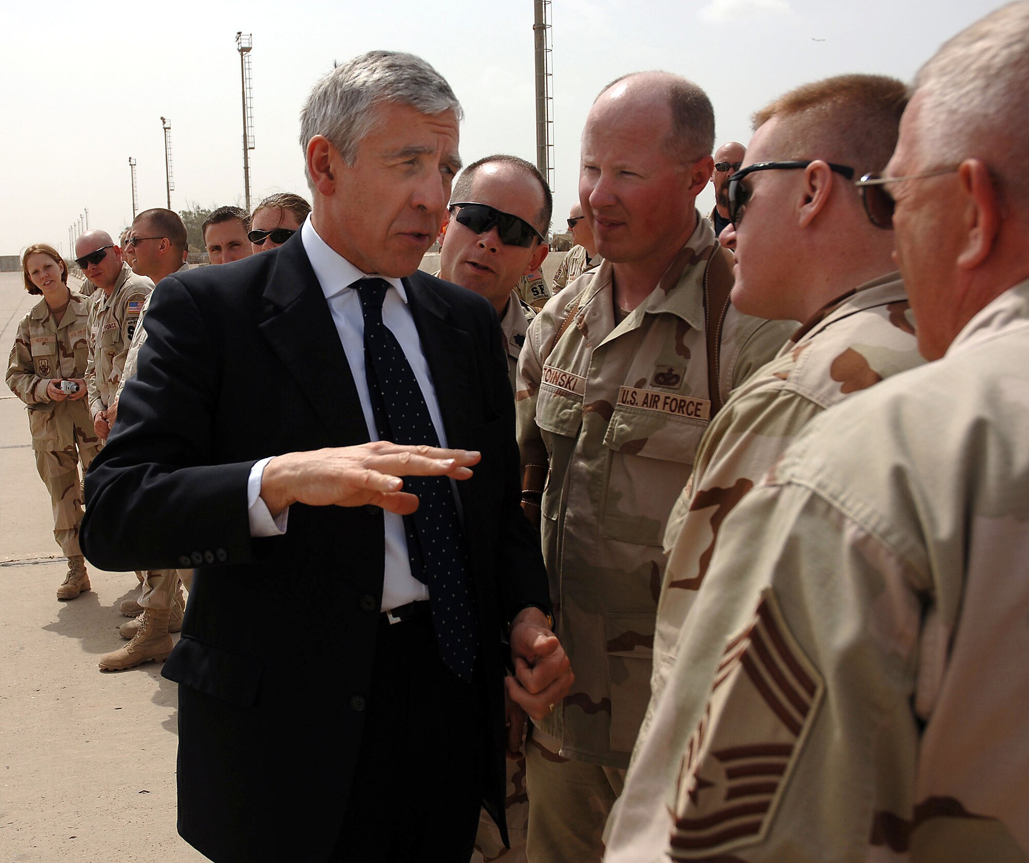 Jack Straw, United Kingdom foreign secretary, talks to Master Sgt. Alan Stoinski and Capt. Troy Basnett at Sather Air Base, Iraq, on Monday, April 3, 2006. Mr. Straw and Condoleezza Rice, U.S. secretary of state, traveled through the military aerial port at Sather after meeting with Iraqi officials in Baghdad. (U.S. Air Force photo/Master Sgt. Will Ackerman)
 
