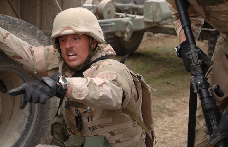 Tech. Sgt. Timothy Powers expedites the evacuation of a simulated convoy casualty during the Basic Combat Convoy Training course at Camp Bullis, Texas, Monday, April 3. 2006.  The course is designed to keep Airmen battlefield focused and well-trained for convoy operations. (U.S. Air Force photo/Tech. Sgt. Cecilio Ricardo Jr.)  