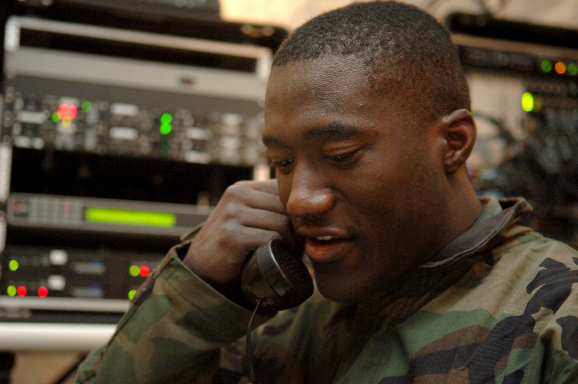 Staff Sgt. Rodney Jeter-Hicks coordinate's computer routes at a simulated deployed location on Tuesday, April 4, 2006.  Sergeant Jeter-Hicks is a messaging technician with the 355th Communications Squadron (U.S. Air Force photo/Staff Sgt. Lanie McNeal) 