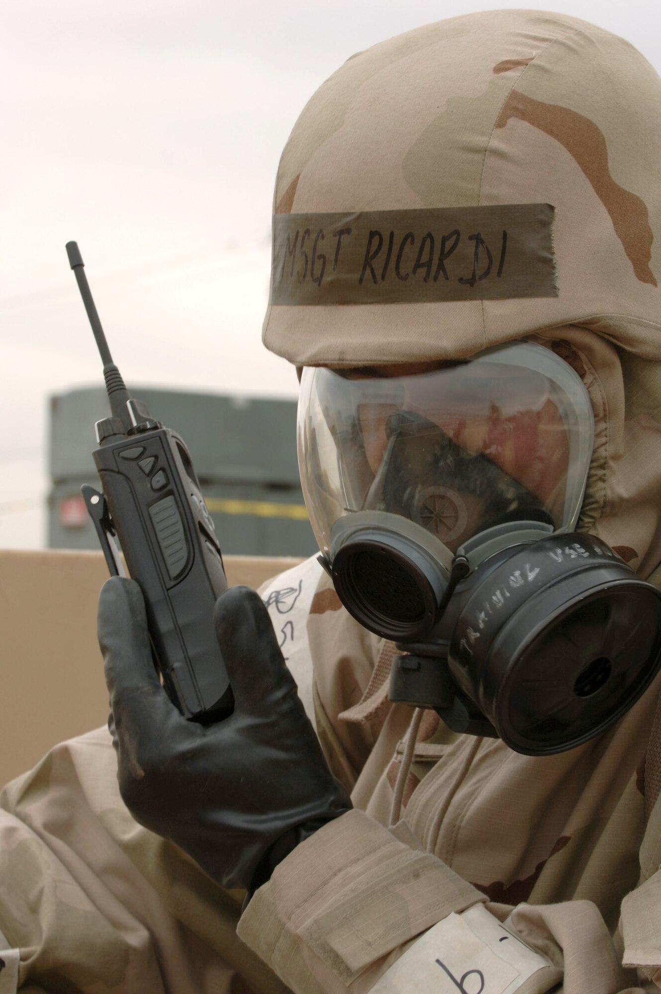 Master Sgt. Marcus Ricardi directs personnel movements from an improvised bunker at a simulated deployment location on Tuesday, April 4, 2006.  Sergeant Ricardi is with the 355th Communications Squadron.  (U.S. Air Force photo/Staff Sgt. Lanie McNeal)