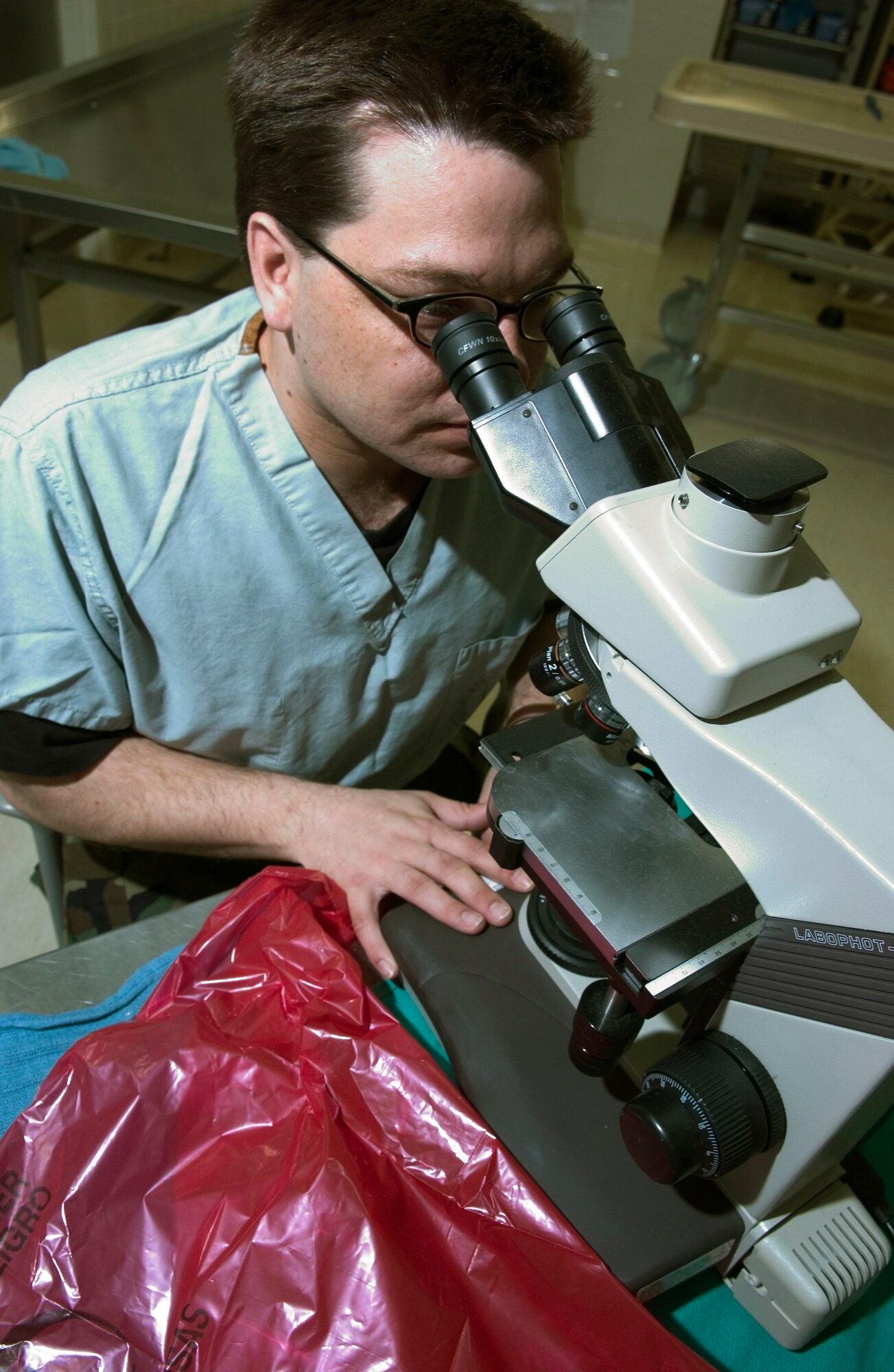 Staff Sgt. Michael Taylor performs function checks on a microscope at Elmendorf Air Force Base, Alaska, on Thursday, March 23, 2006. He uses the microscope to look at skin tissues for cancer or other diseases.  Sergeant Taylor is with the 3rd Medical Group. (U.S. Air Force photo/Airman Jonathan Steffen)

