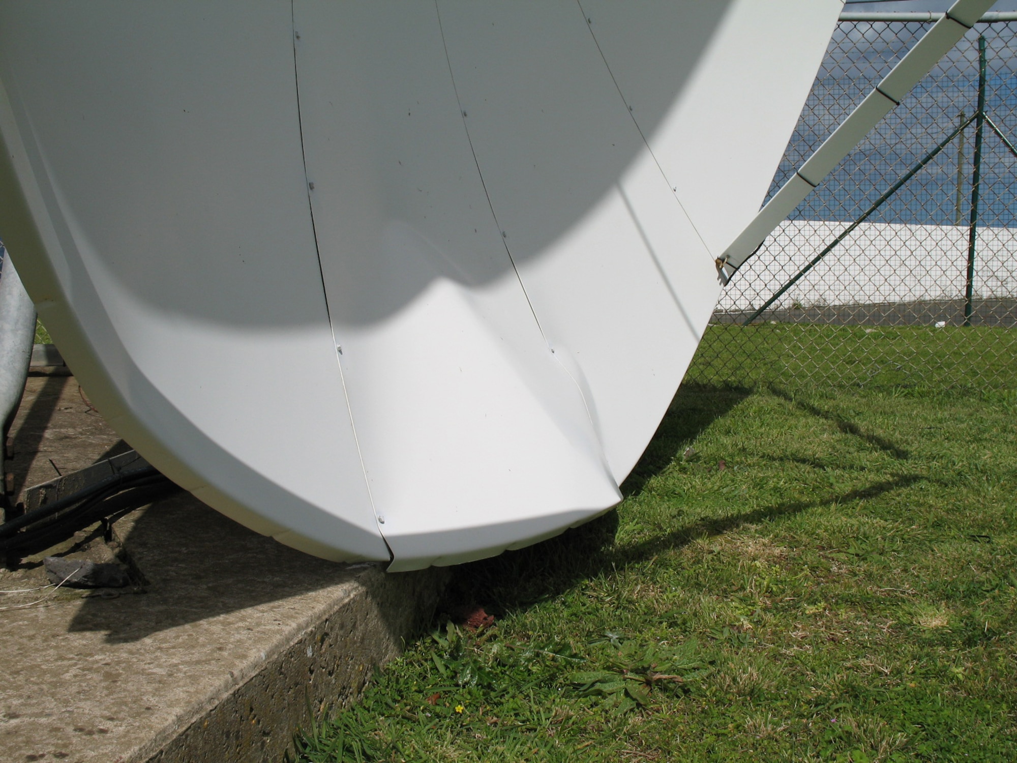 The AFN satellite was damaged by high winds. (Photo by Staff Sgt. Troy Bolling)