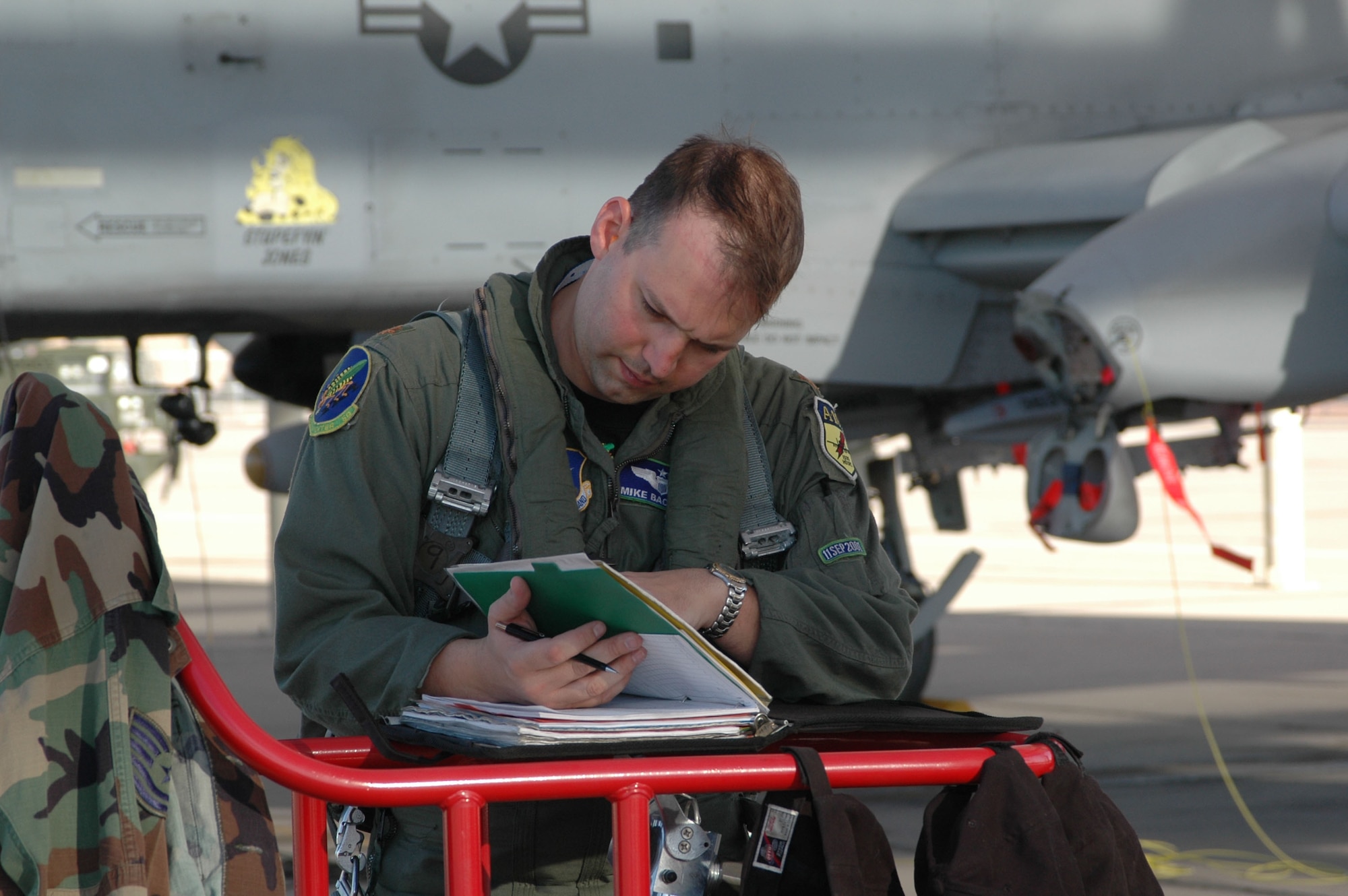 Maj. Michael Bachtell, 47th Fighter Squadron A-10 pilot, completes his maintenance forms after competing in Hawgsmoke 2006. He was later named third overall best pilot for his performance that day. (Photo by 1st Lt. Torri White)