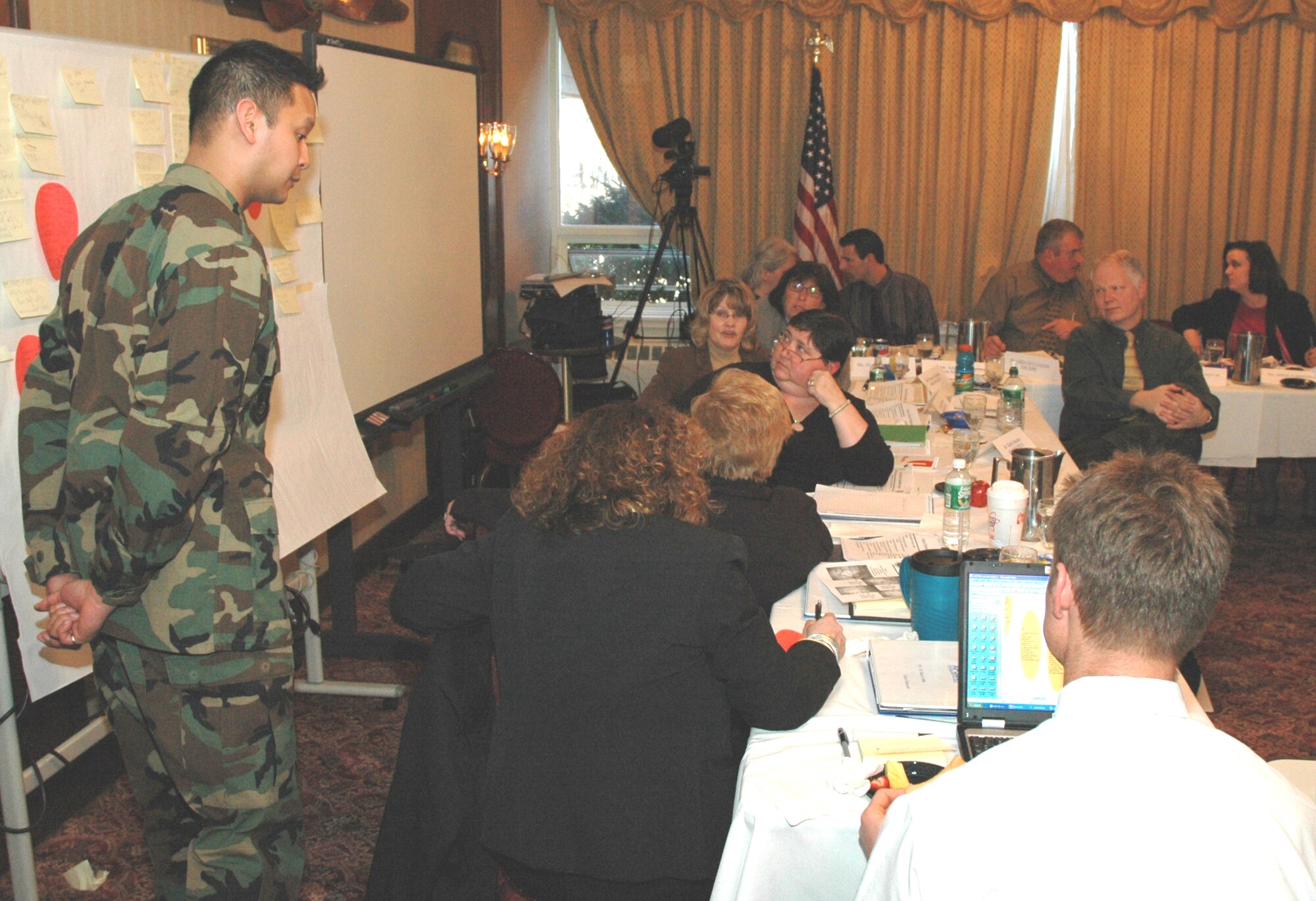 HANSCOM AIR FORCE BASE, Mass. - Air Force Reserve Capt. Robert Enrico facilitates a Rapid Improvement Event team as they examine ways to improve the civilian hiring process. (Air Force photo by Mark Wyatt)

