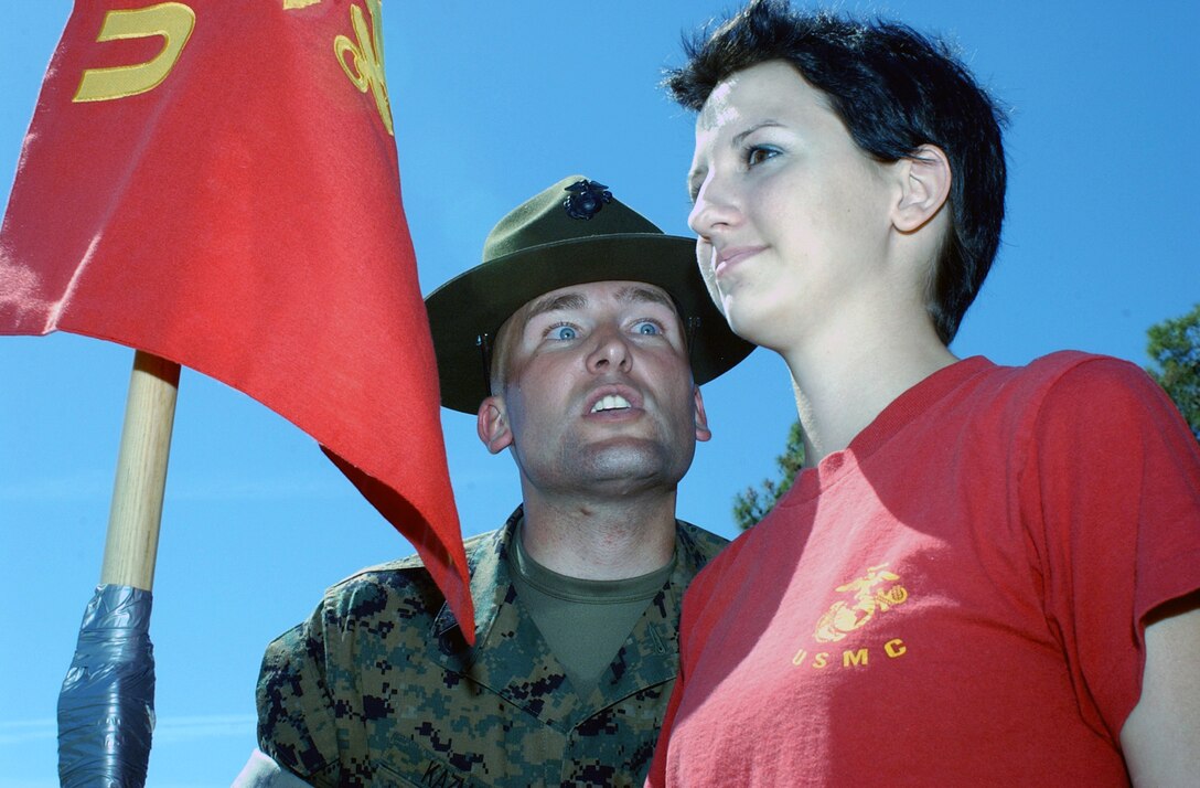 Gunnery Sgt. Dustin Kazmar, Chief Drill Instructor with Kilo Co., 3rd Recruit Training Battalion, Marine Corps Recruit Depot, San Diego, corrects RS Phoenix poolee Victoria Lieder. Lieder, with RSS Deer Valley, recently moved to Phoenix from Waco, Texas. She leaves for recruit training September 25.