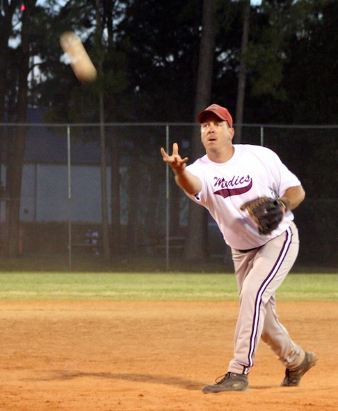 Ronn Mann, 16th Medical Group pitcher, delivers to the plate against the 20th Special Operations Squadron Tuesday. (photograpg by Master Sgt. Stuart Camp)