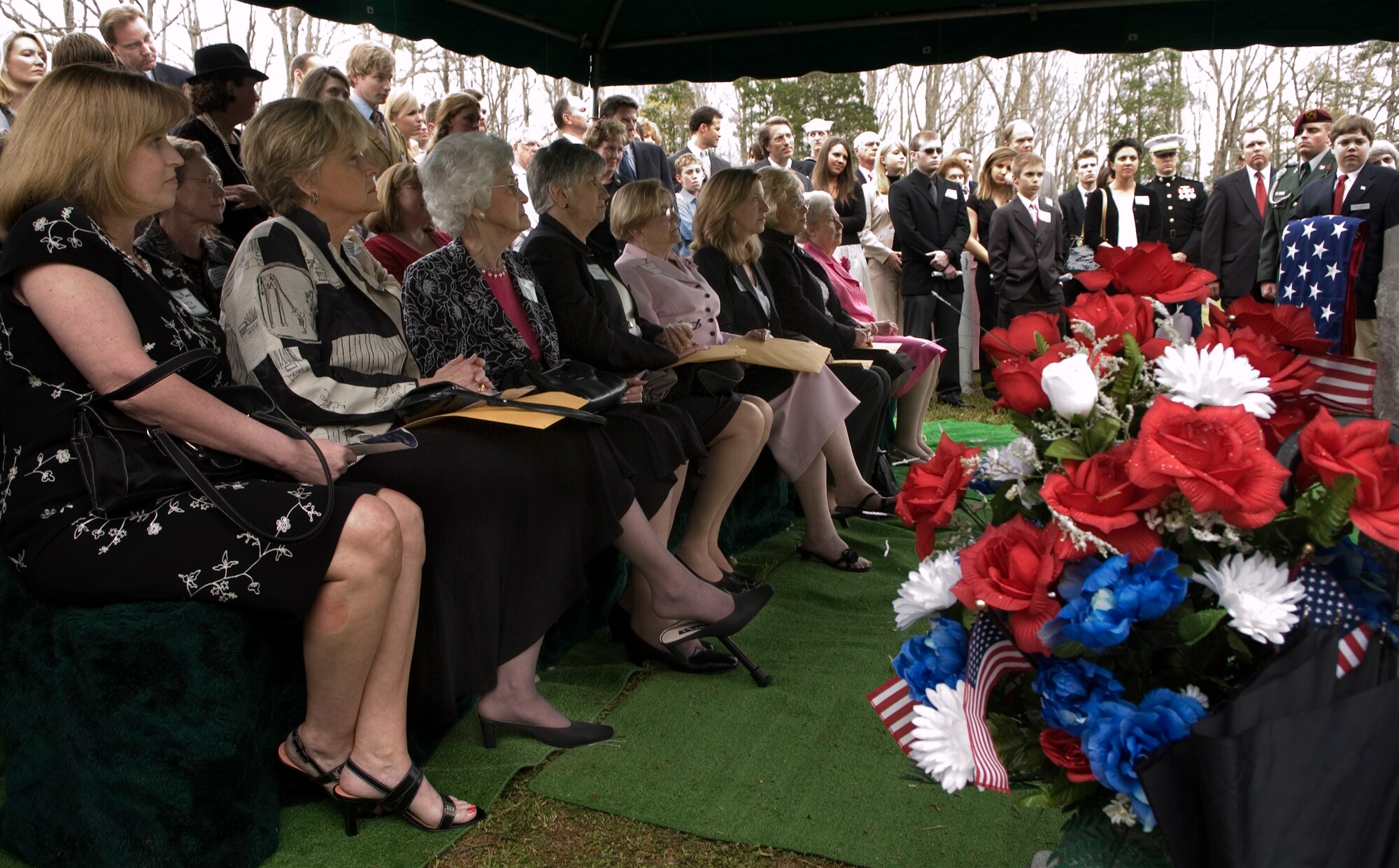 Family members of 2nd Lt. Robert Hoyle Upchurch attend a memorial service Saturday, April 8, 2006 in High Falls, N.C.  He was killed when his P-40 Warhawk crashed in China in 1944 during bad weather.  Lieutenant Upchurch was a member of the famed Flying Tigers during World War II and was listed as missing in action until his remains were identified last May by the Joint POW/MIA Accounting Command.  (U.S. Air Force photo/Master Sgt. Jack Braden)