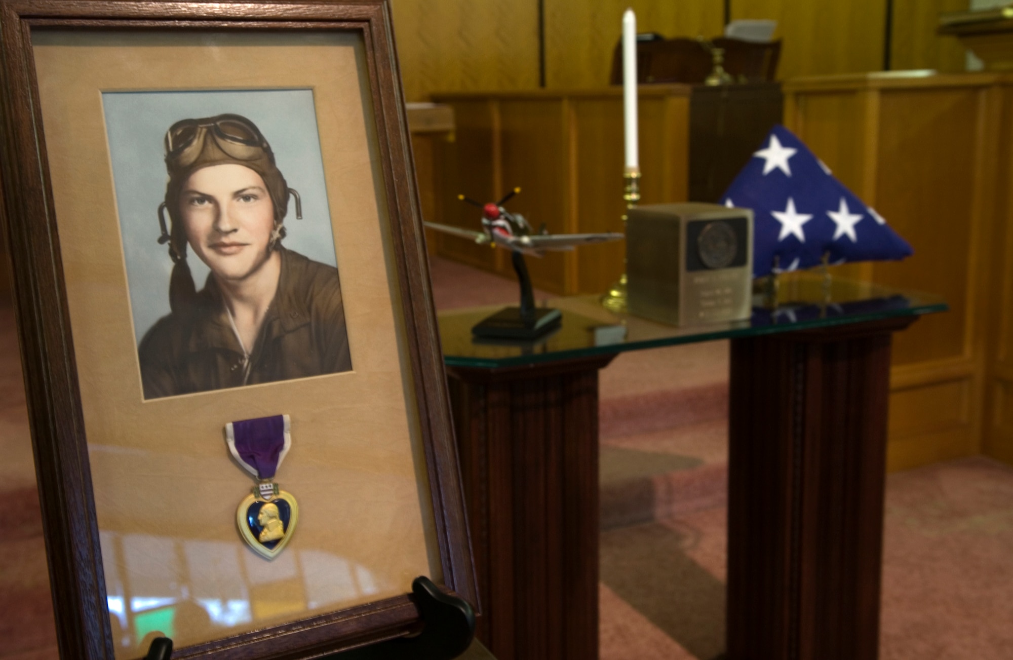 A photo of 2nd Lt. Robert Hoyle Upchurch, who was killed when his P-40 Warhawk crashed in China in 1944 during bad weather, is displayed during memorial services on Saturday, April 8, 2006, in High Falls, N.C.  Lieutenant Upchurch was a member of the famed Flying Tigers during World War II and was listed as missing in action until his remains were identified last May by the Joint POW/MIA Accounting Command. (U.S. Air Force photo/Master Sgt. Jack Braden)