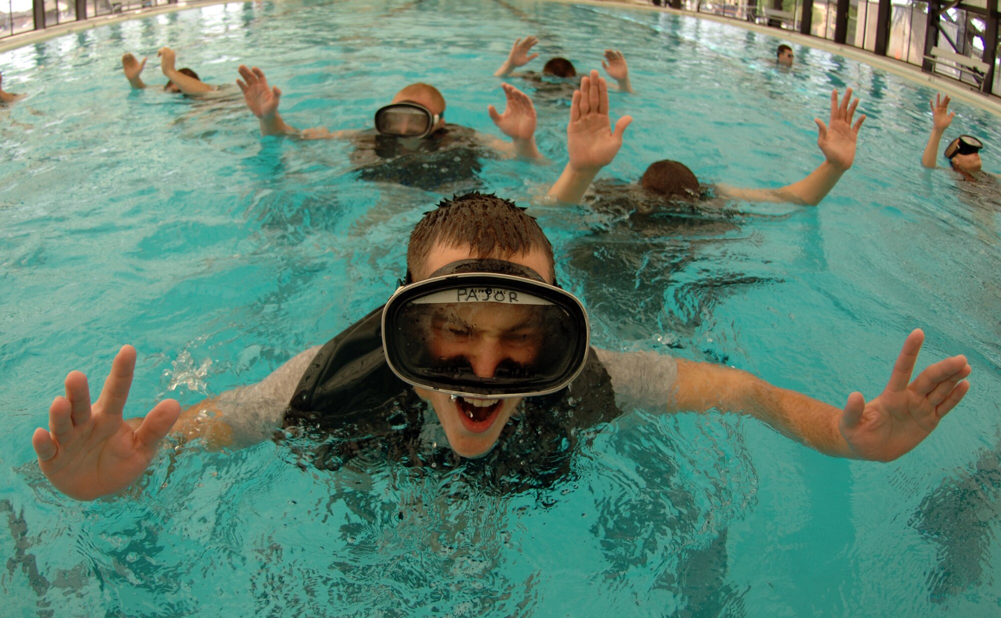 Airman 1st Class Brian Pajor treads water with 16-pound weights on his belt during the pararescue indoctrination training course at Lackland Air Force Base, Texas, on Thursday, April 6, 2006.  The 10-week indoctrination training is the first hurdle of intense physical and mental training for pararescue hopefuls. It prepares them for the 12 to 15 months of extreme training they must pass to become Air Force pararescue members. (U.S. Air Force photo/Tech. Sgt Cecilio M. Ricardo Jr.) 
