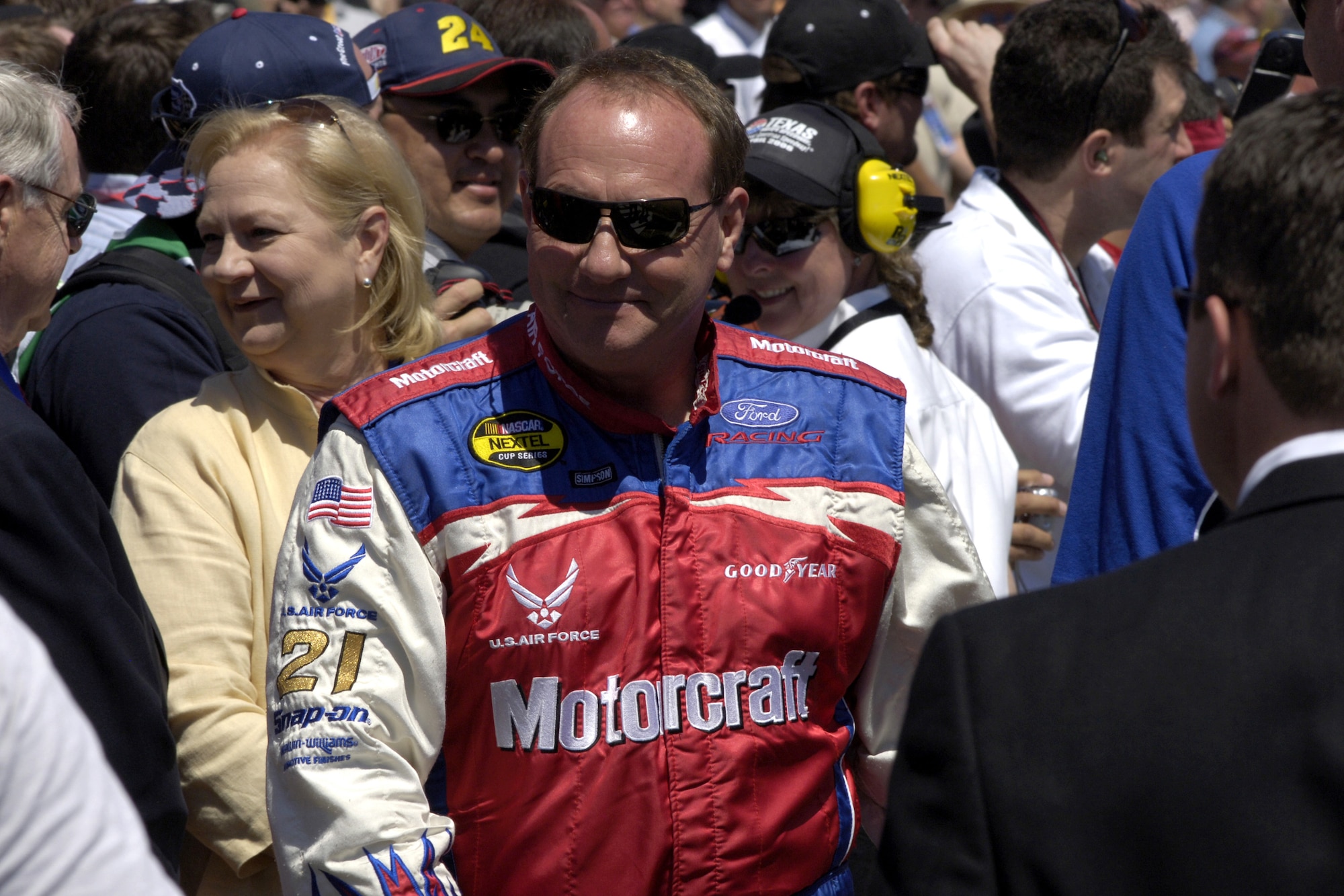 Ken Schrader, the number 21 Motorcraft/Air Force NASCAR Nextel Cup Series driver, makes his way through the crowd during driver introductions at the Samsung/RadioShack 500 on Sunday, April 9, 2006, at Texas Motor Speedway. Schrader finished 16th, after qualifying 32nd, in a field of 43 drivers. (U.S. Air Force photo/Senior Airman Brian Ferguson) 
