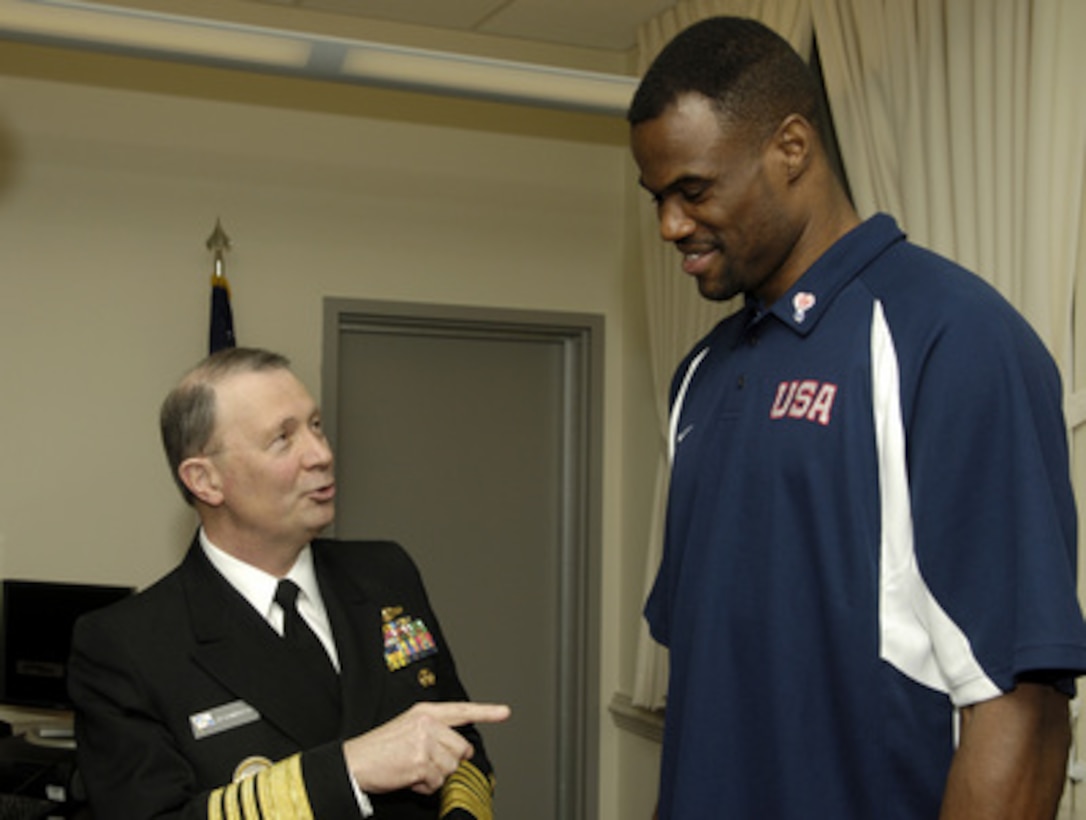 Vice Chairman of the Joint Chiefs of Staff Adm. Edmund G. Giambastiani Jr., U.S. Navy, greets National Basketball Association superstar David Robinson during a visit by Team USA to the Pentagon in Arlington, Va., on April 6, 2006. Robinson and other basketball superstars are in the Pentagon to hold a special basketball clinic for children of deployed and active duty military members as part of April's "National Month of the Military Child." 